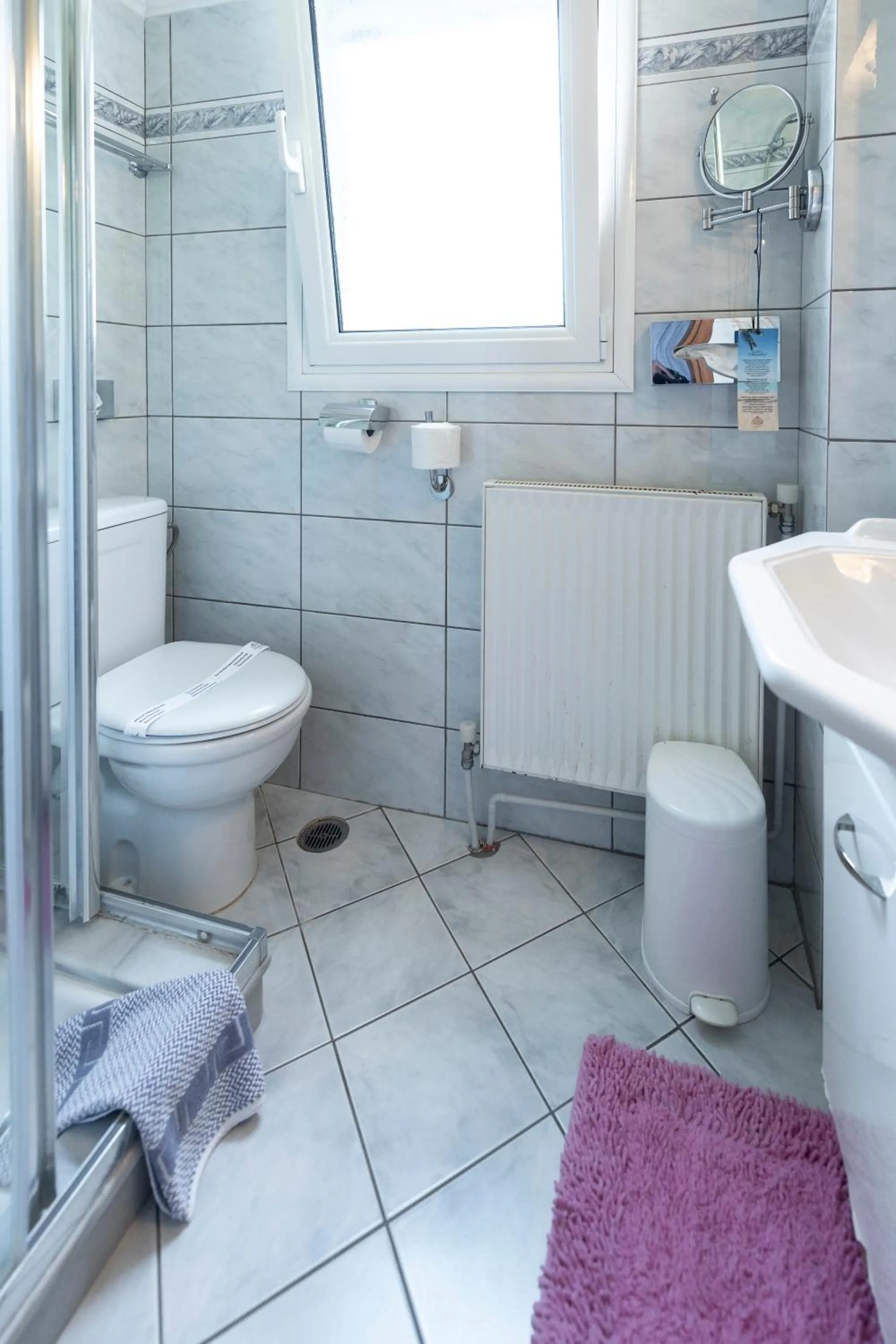 Bathroom in Irida Beach Resort Suites