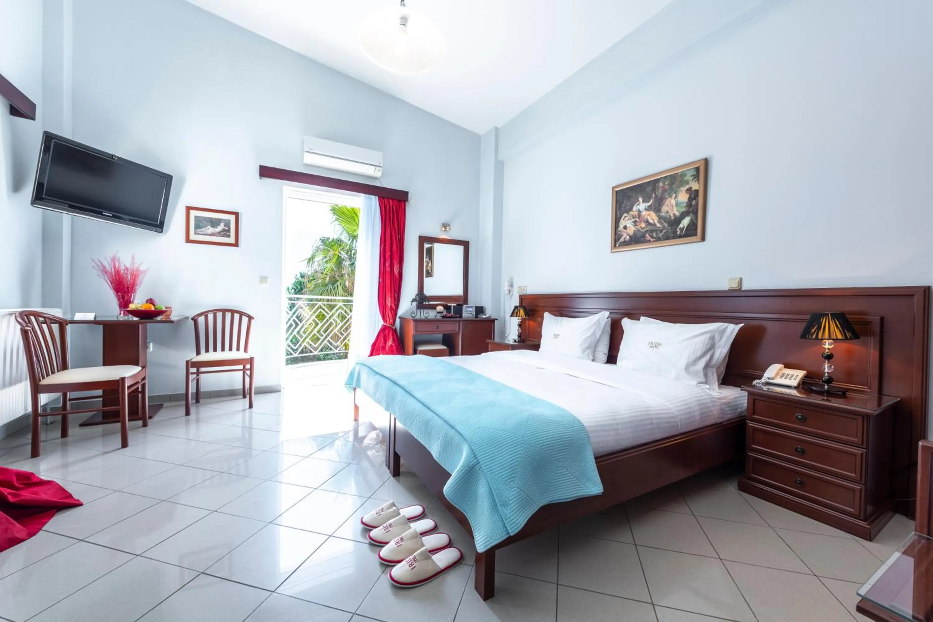 Bed in Irida Beach Resort Suites