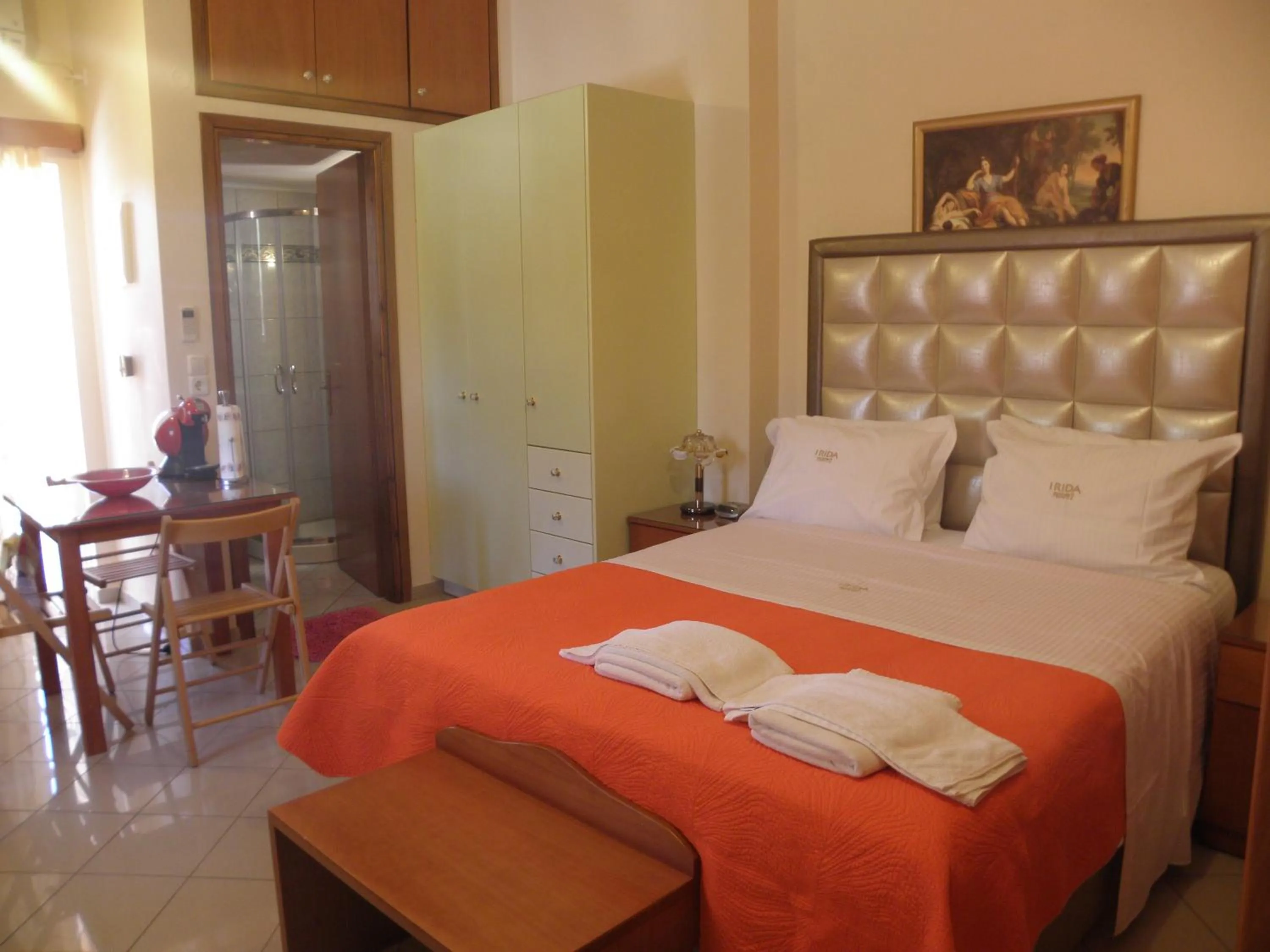 Coffee/tea facilities, Bed in Irida Beach Resort Suites