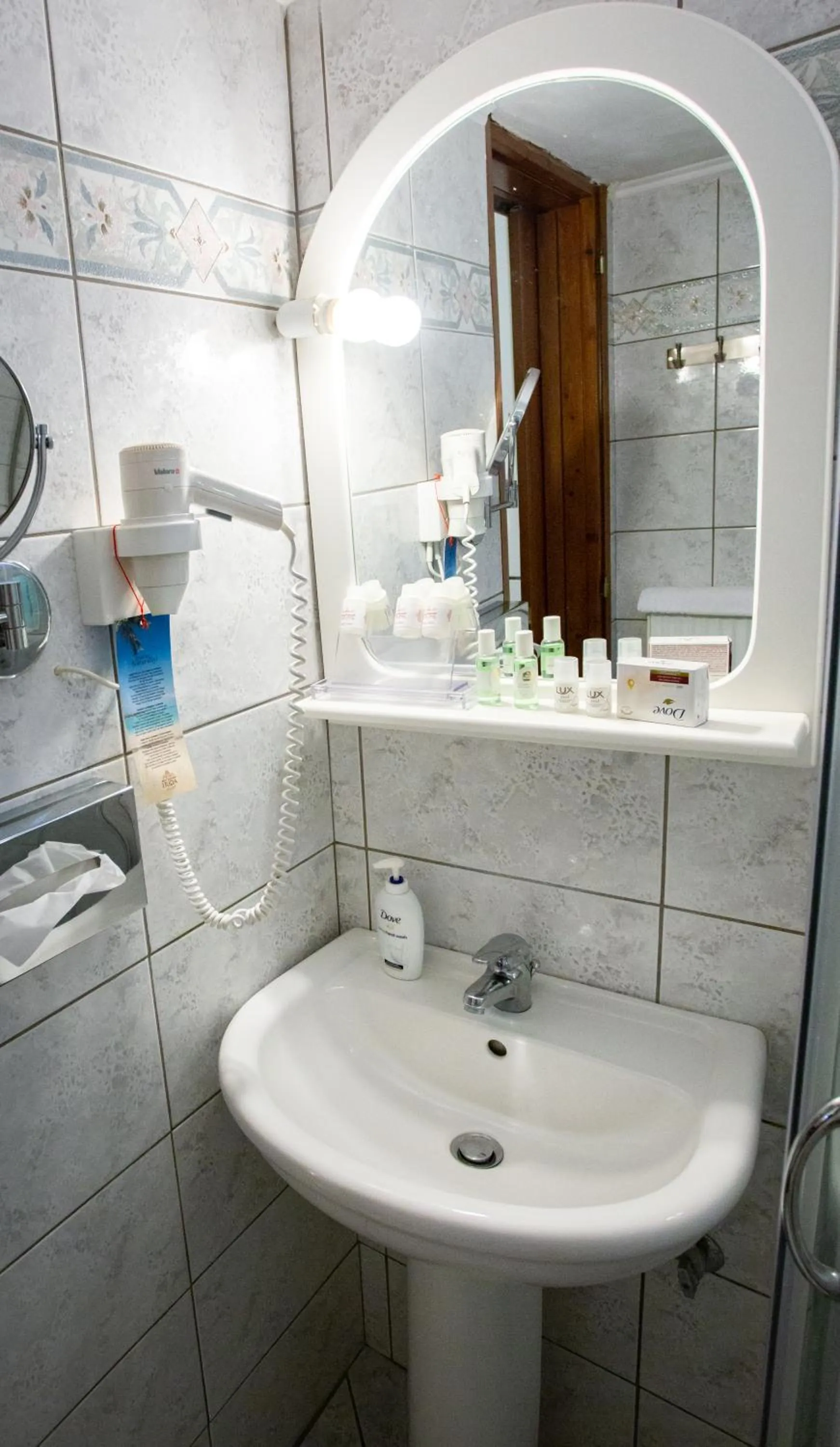 Bathroom in Irida Beach Resort Suites