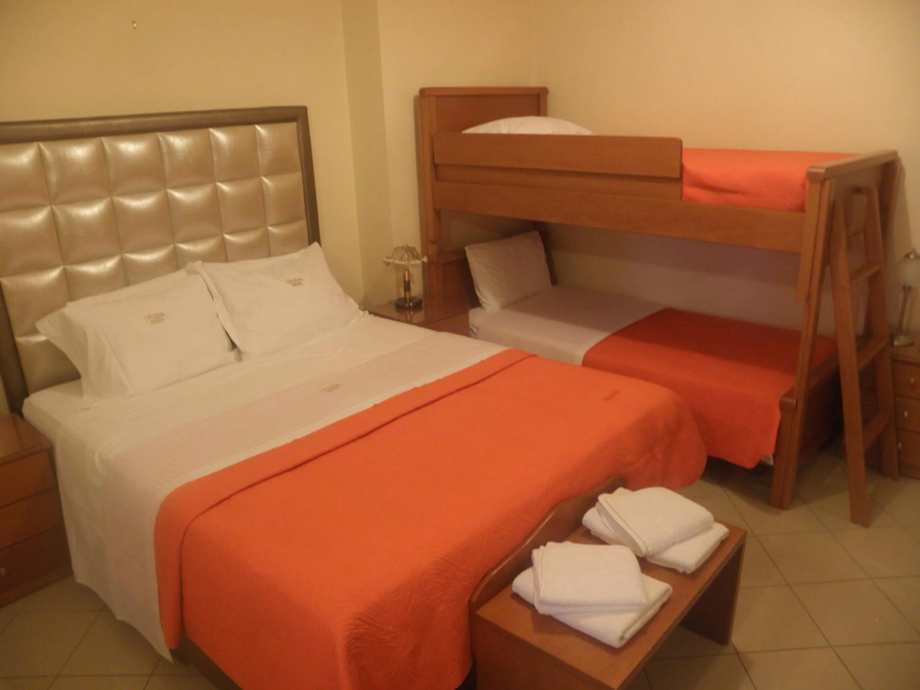 Bed in Irida Beach Resort Suites