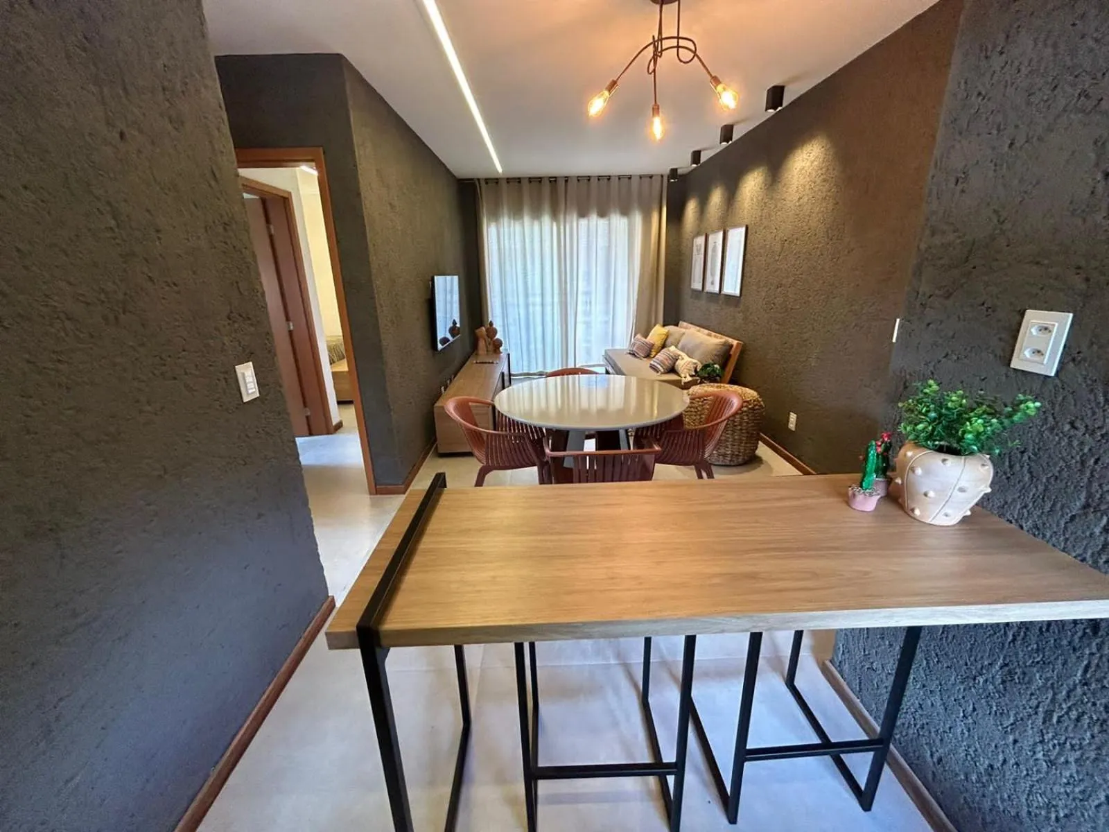 Seating area in KAMBY MILAGRES l Natureza e Conforto