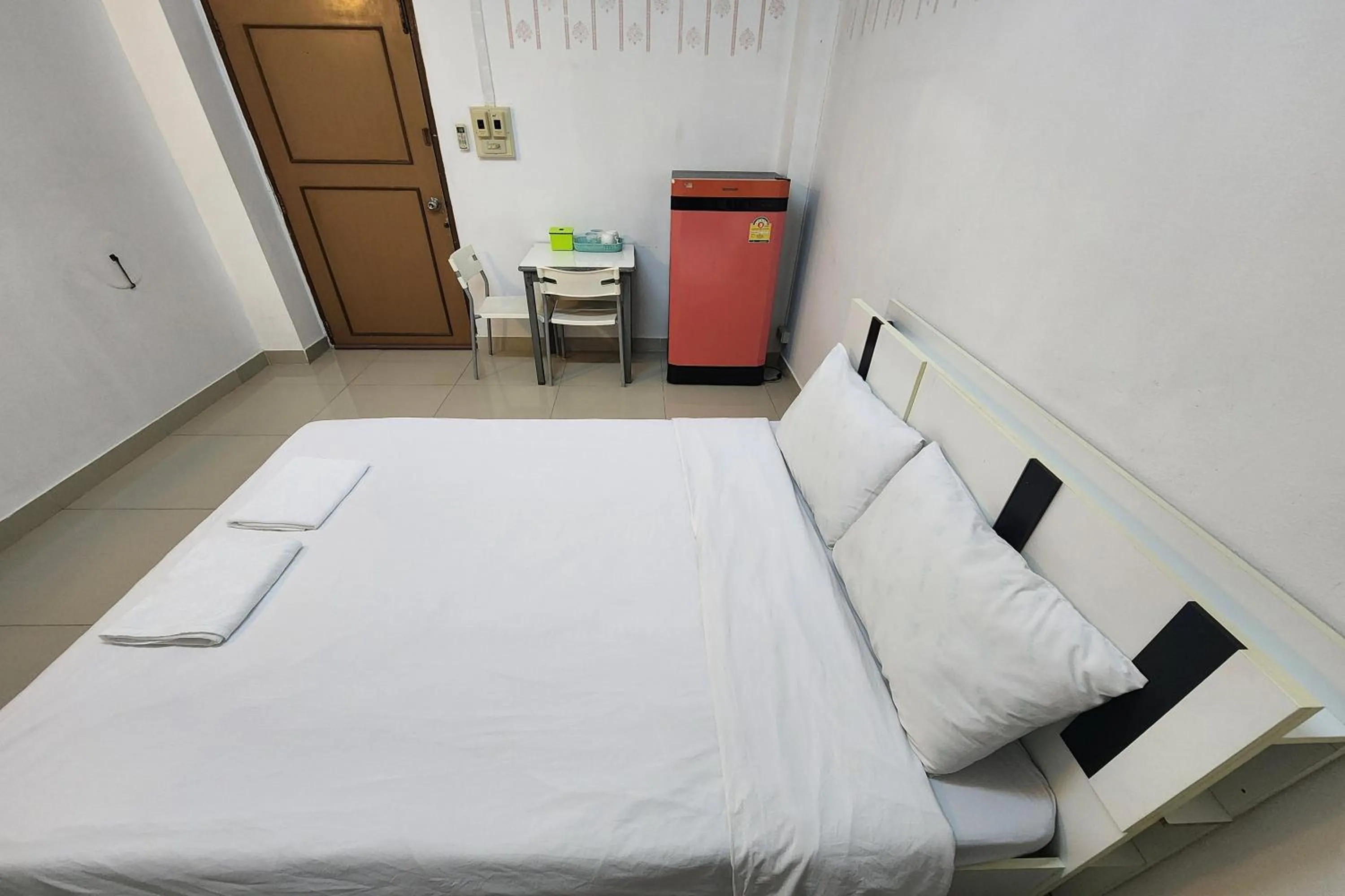 Bed in Green Apartment Kaset