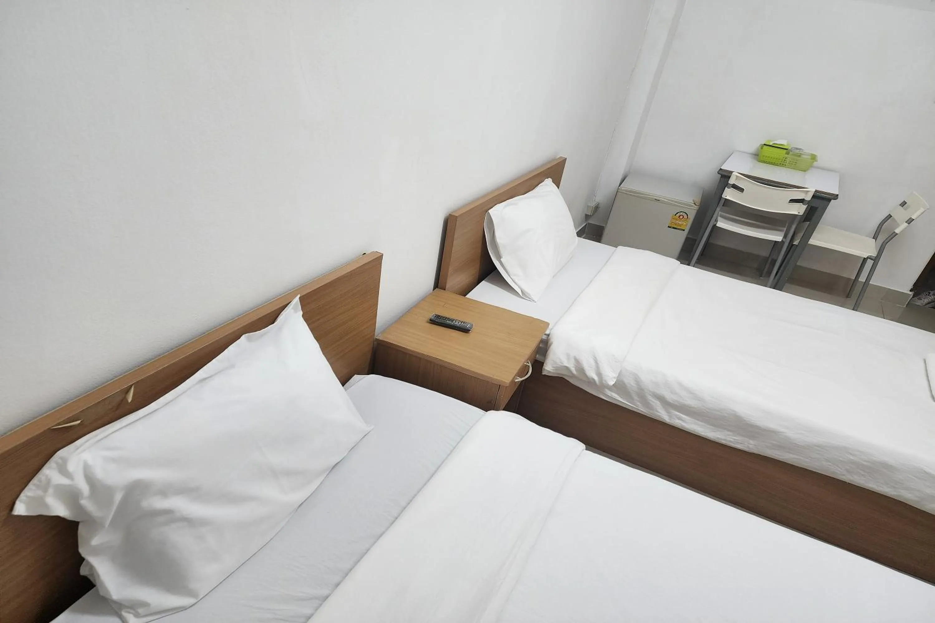 Bed in Green Apartment Kaset
