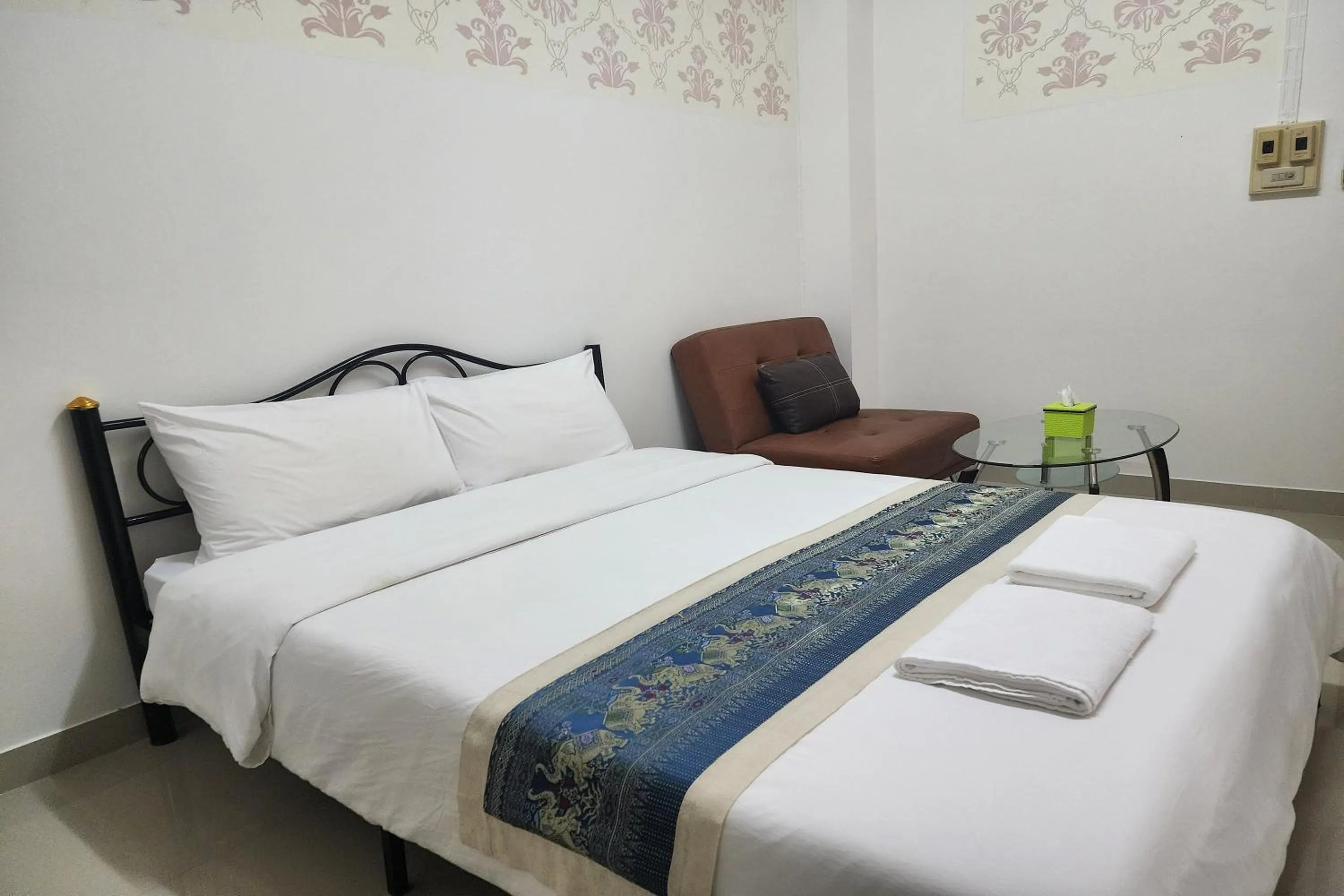 Bed in Green Apartment Kaset