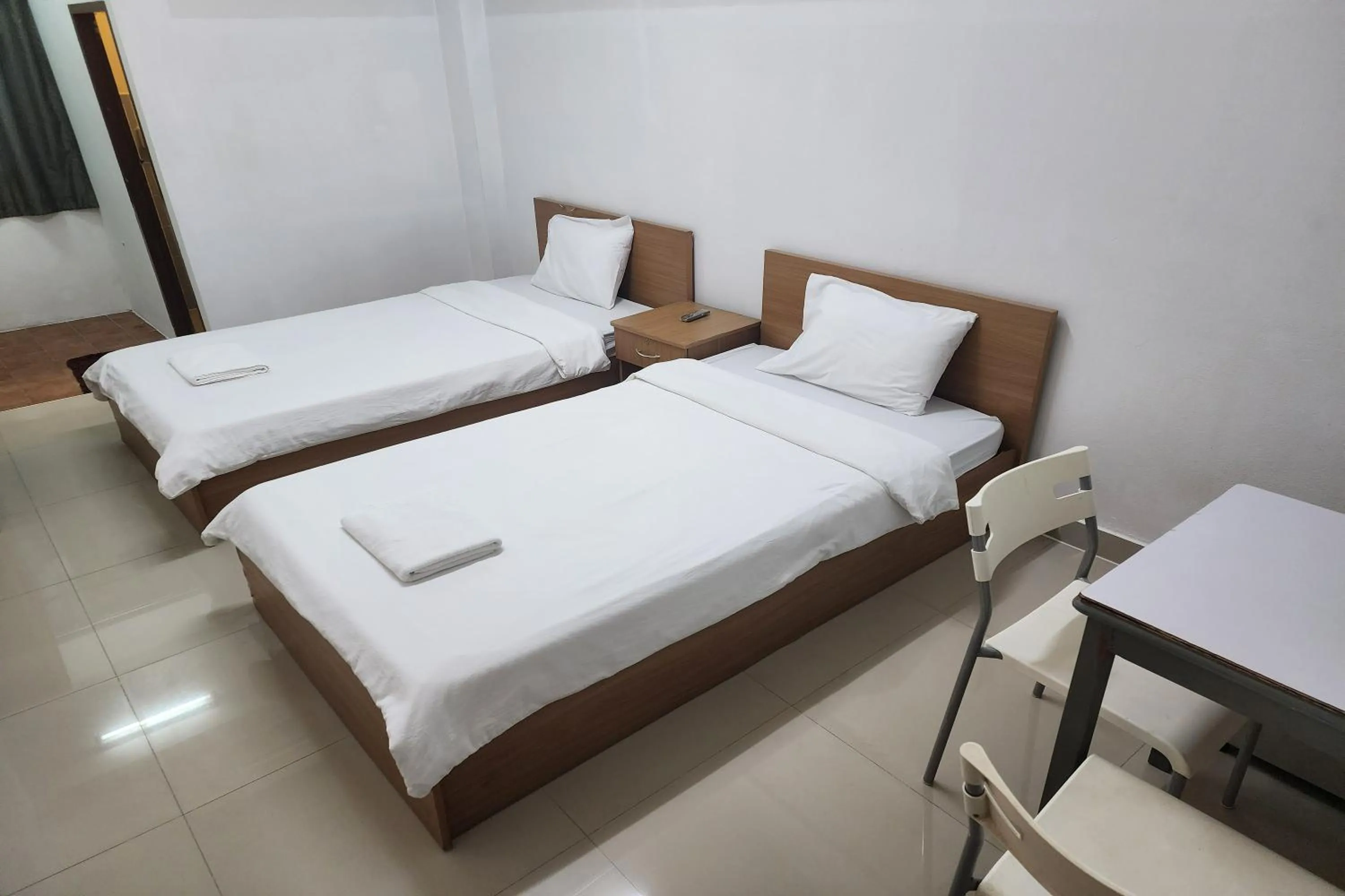 Bed in Green Apartment Kaset