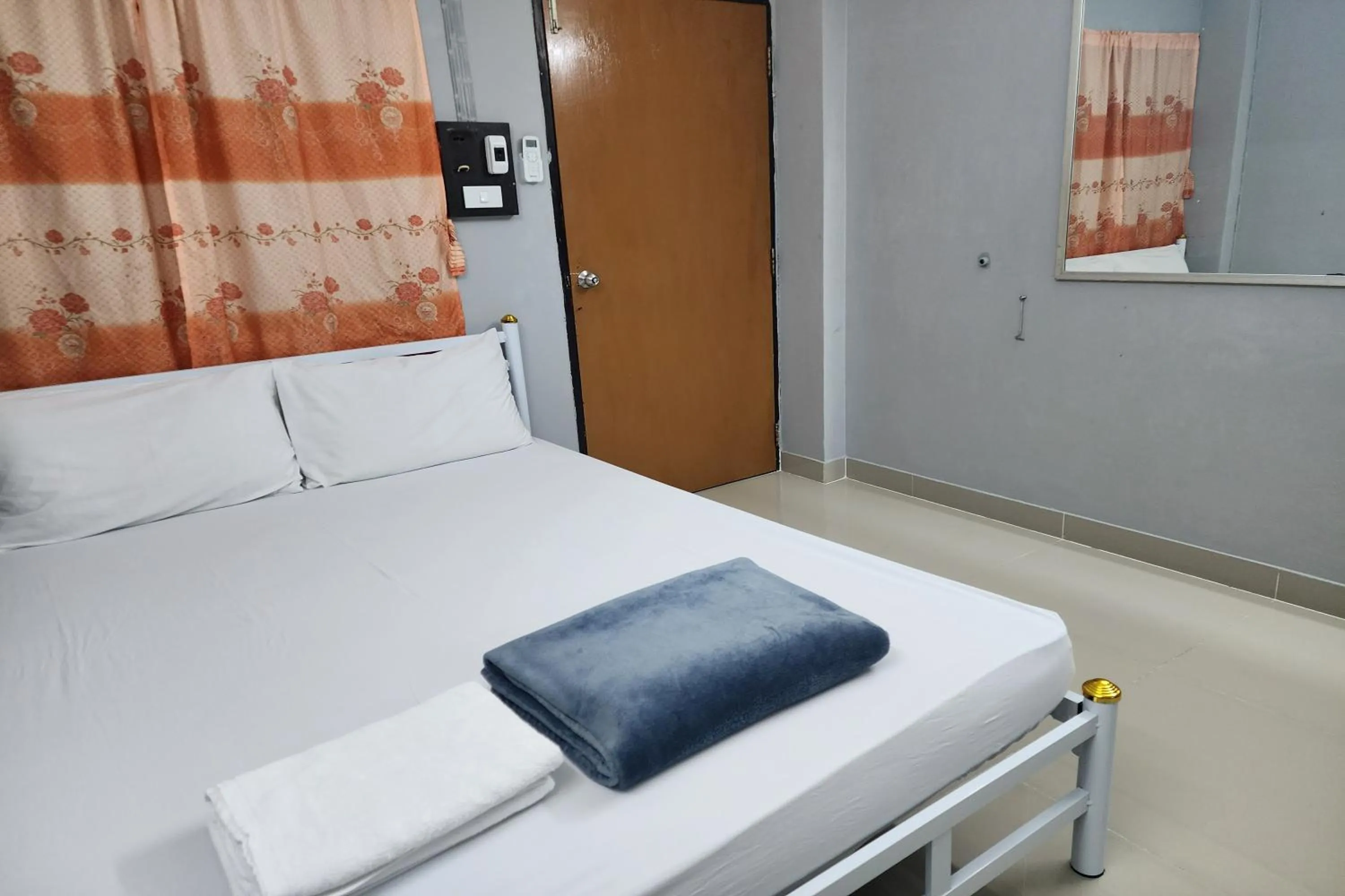 Bed in Green Apartment Kaset