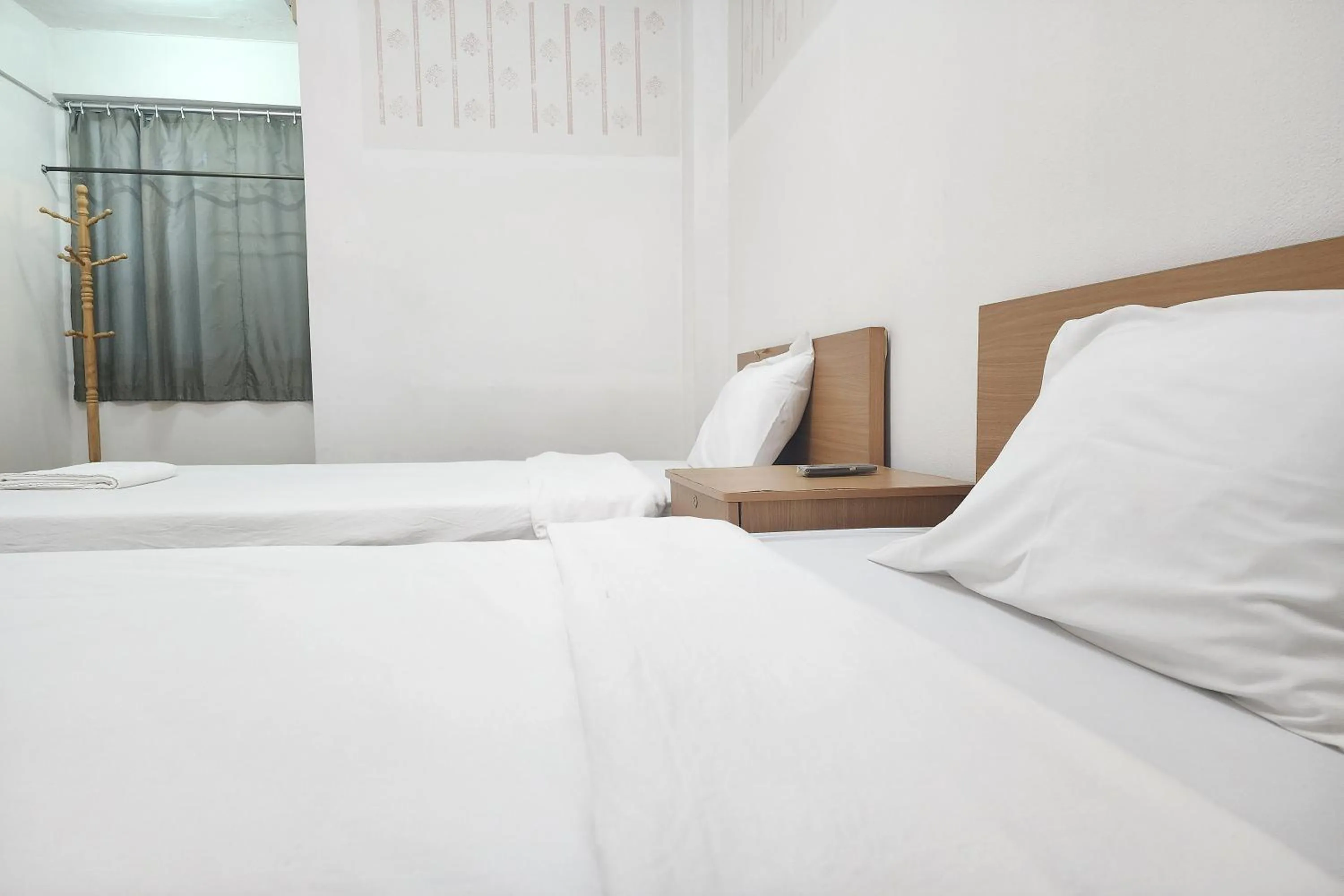 Bed in Green Apartment Kaset