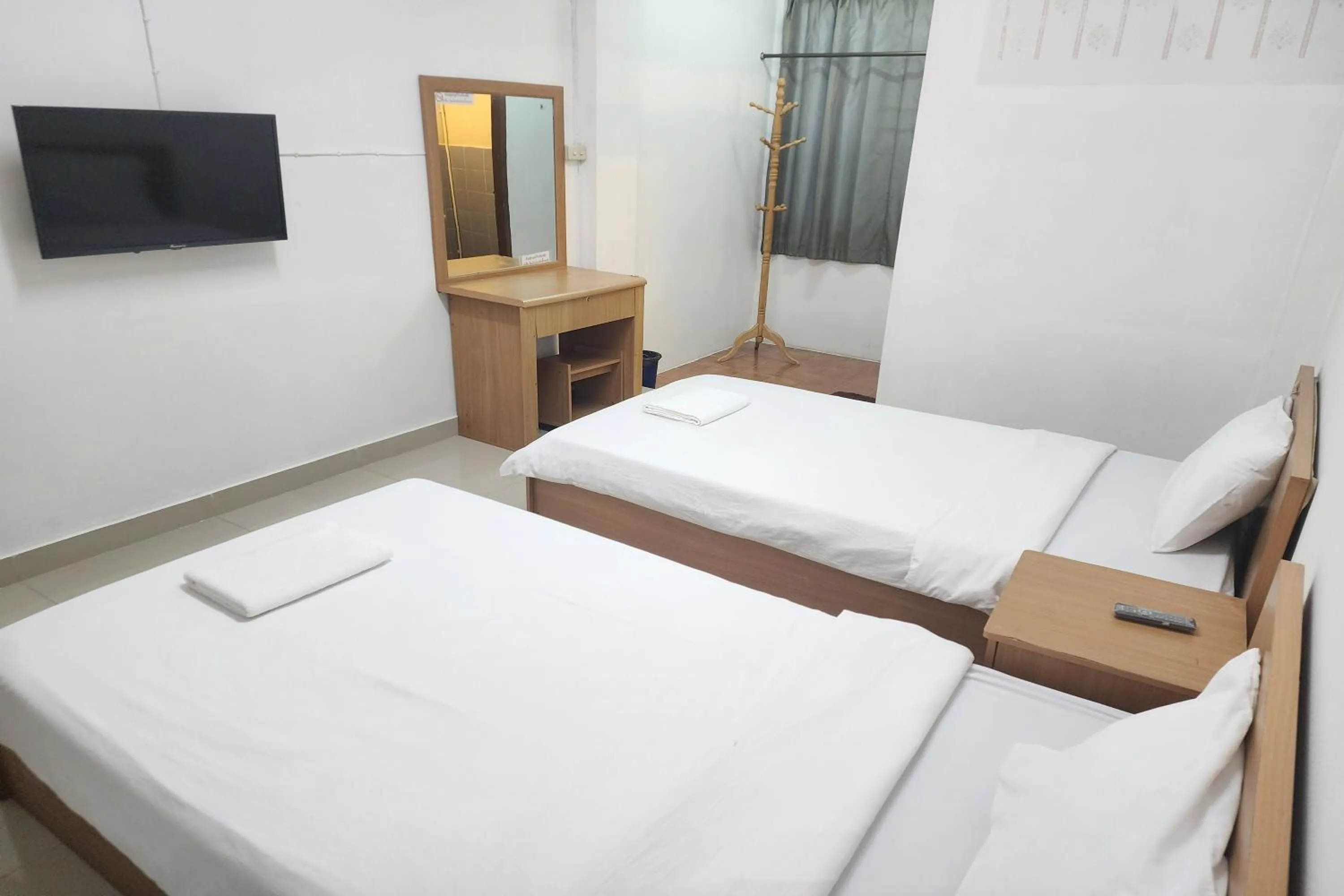 Bed in Green Apartment Kaset