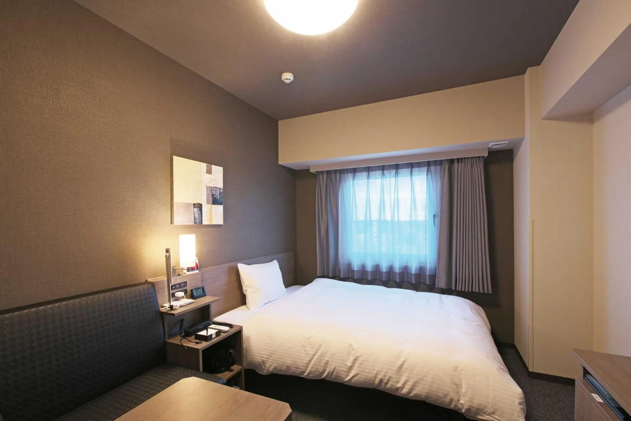 Photo of the whole room, Bed in Hotel Route Inn Choshi Eki Nishi