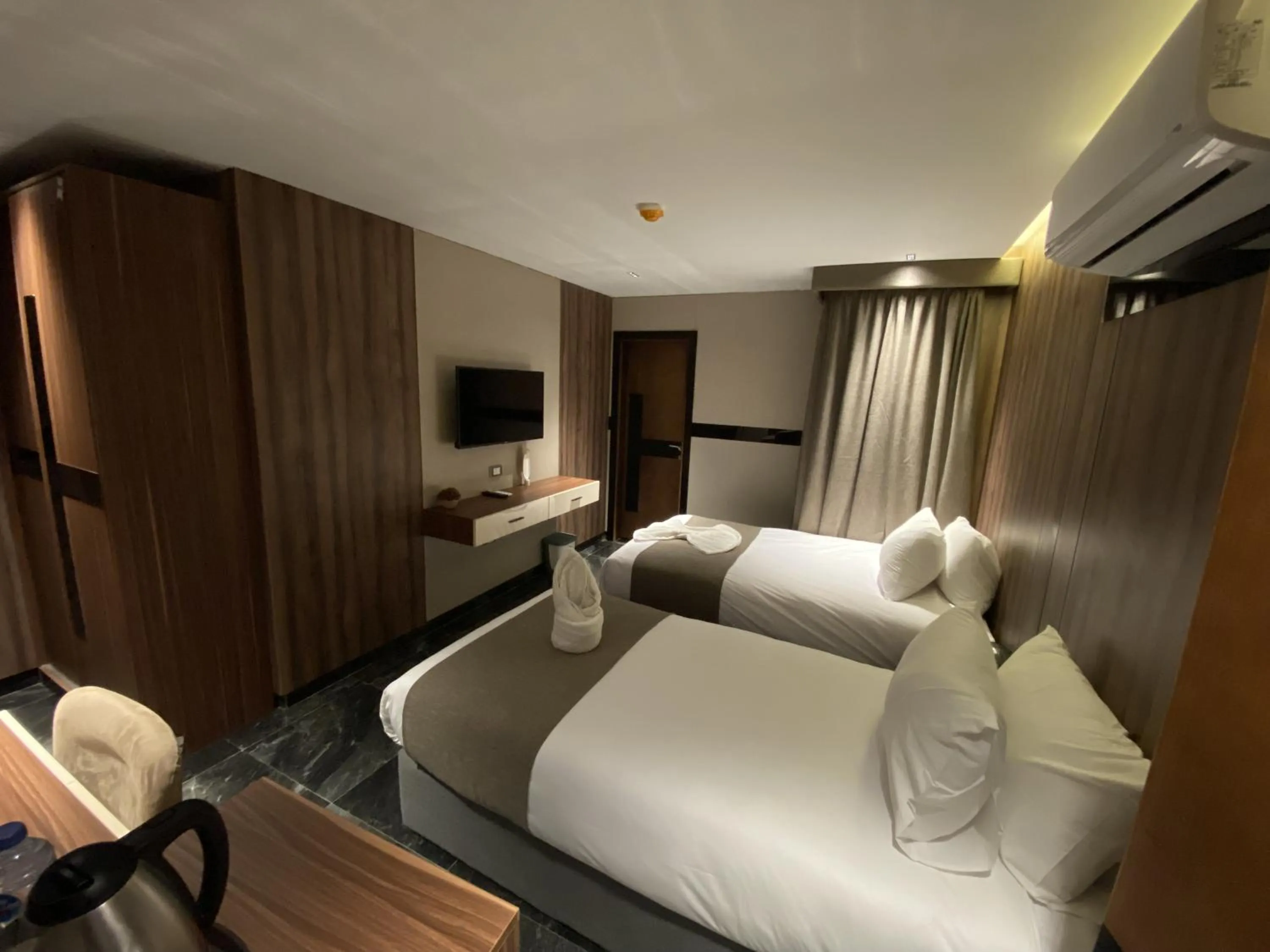 Bed in The View Delta Hotel