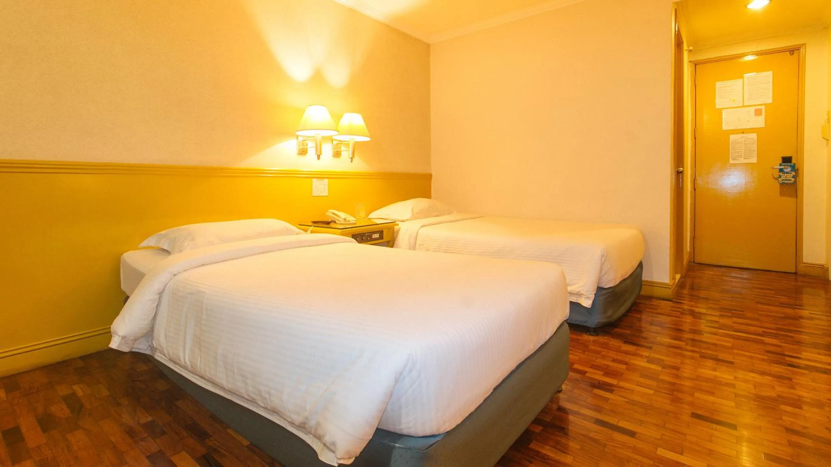 Bed in Aloha Hotel Roxas Boulevard Manila