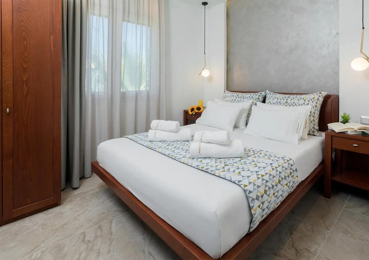 Bed in SUN RESIDENCE Exclusive Seaside Suites