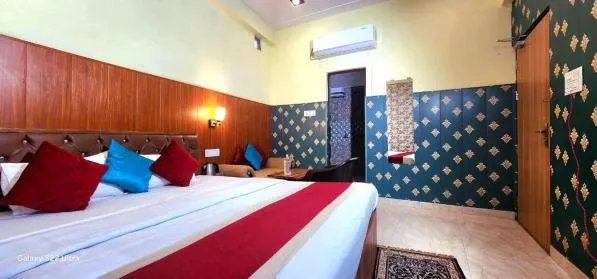 Bed in Hotel Rudra Paradise