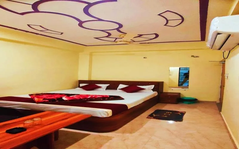 Bed in Hotel Rudra Paradise