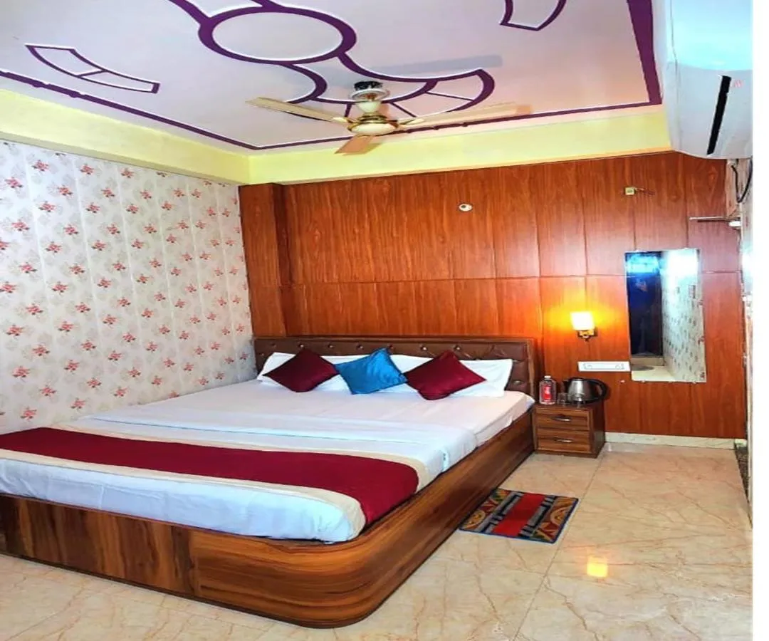 Bed in Hotel Rudra Paradise