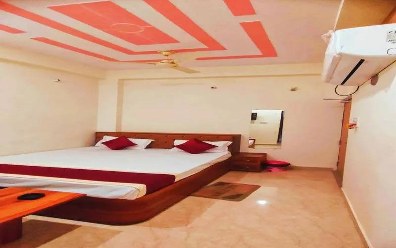 Bed in Hotel Rudra Paradise