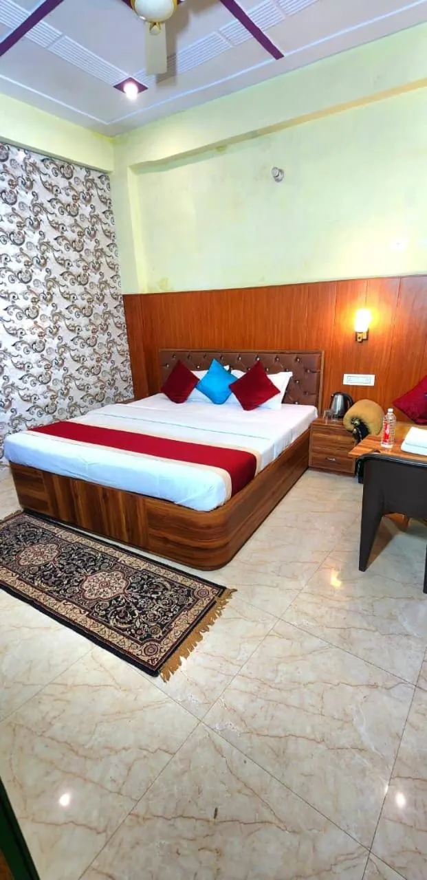 Bed in Hotel Rudra Paradise