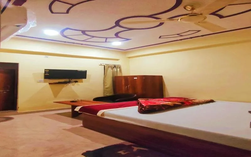 Bed in Hotel Rudra Paradise