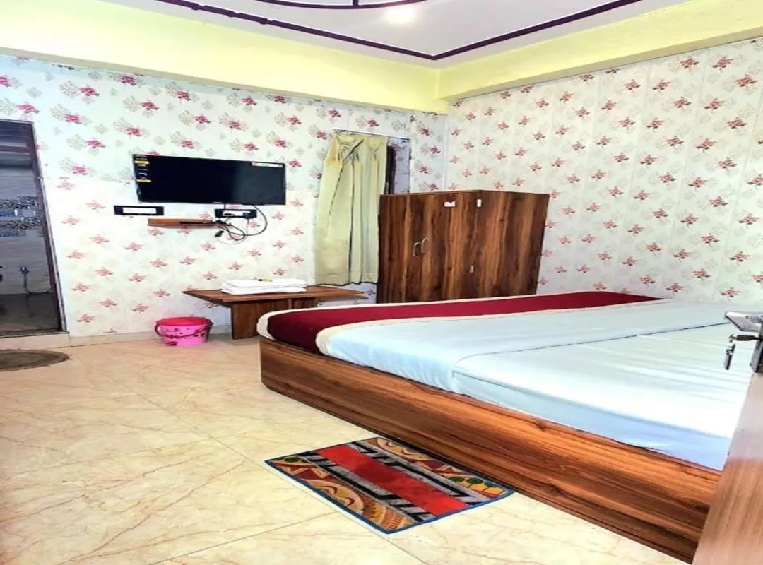 Bed in Hotel Rudra Paradise