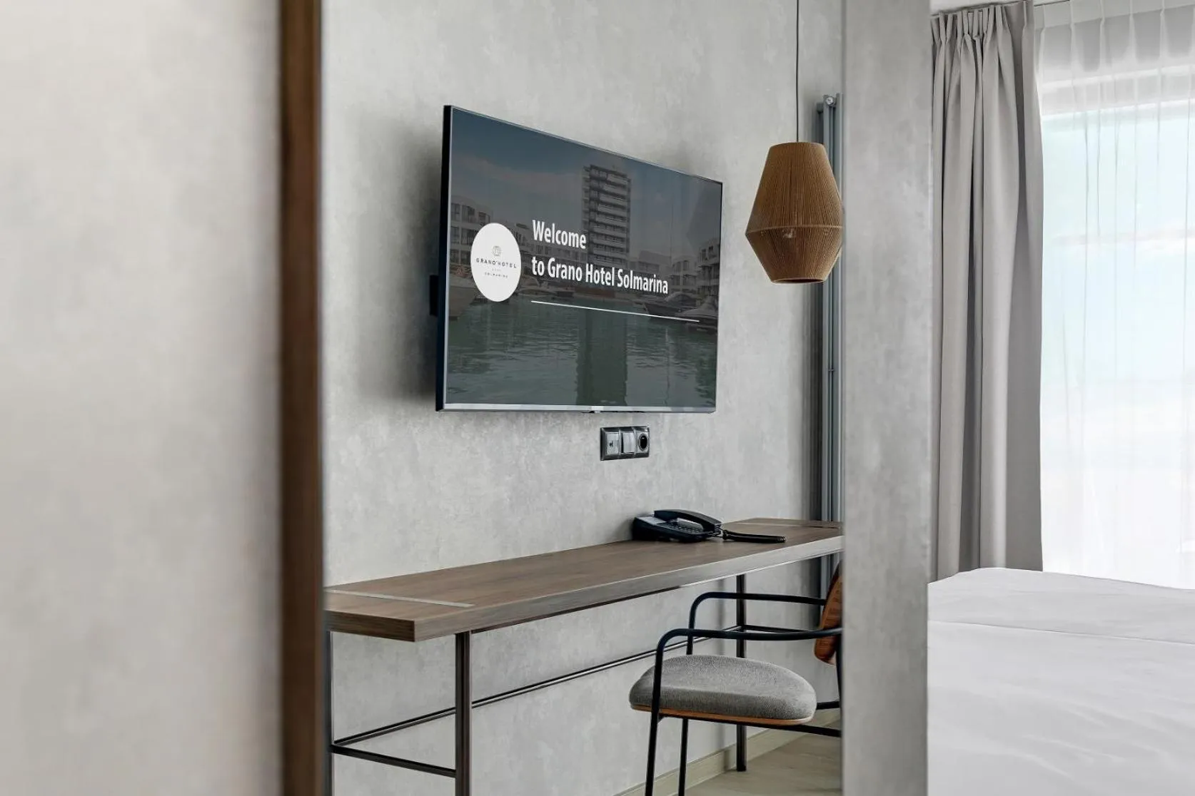 TV and multimedia, Bed in GRANO HOTEL Solmarina