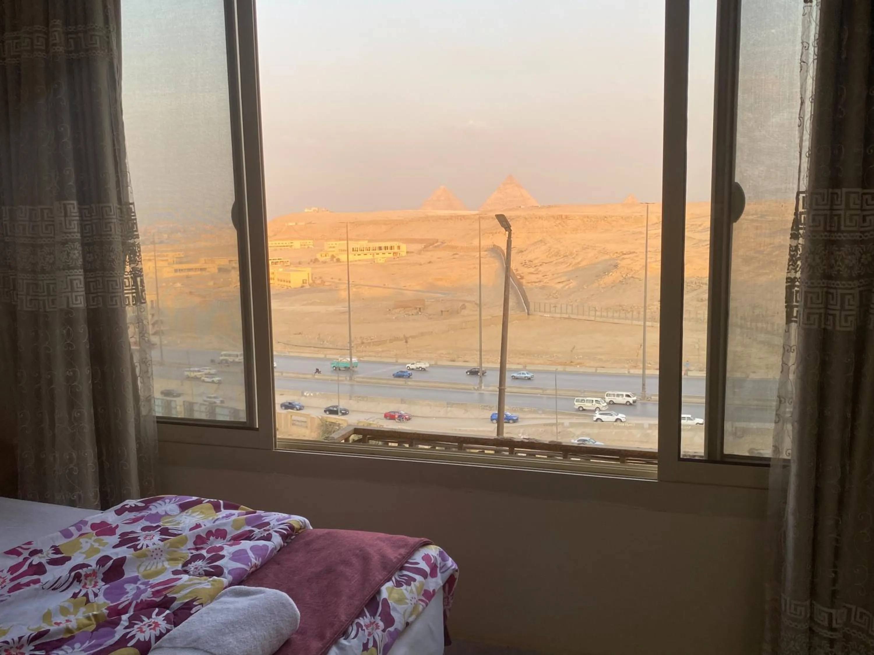 View (from property/room), Bed in Pyramita Hotel