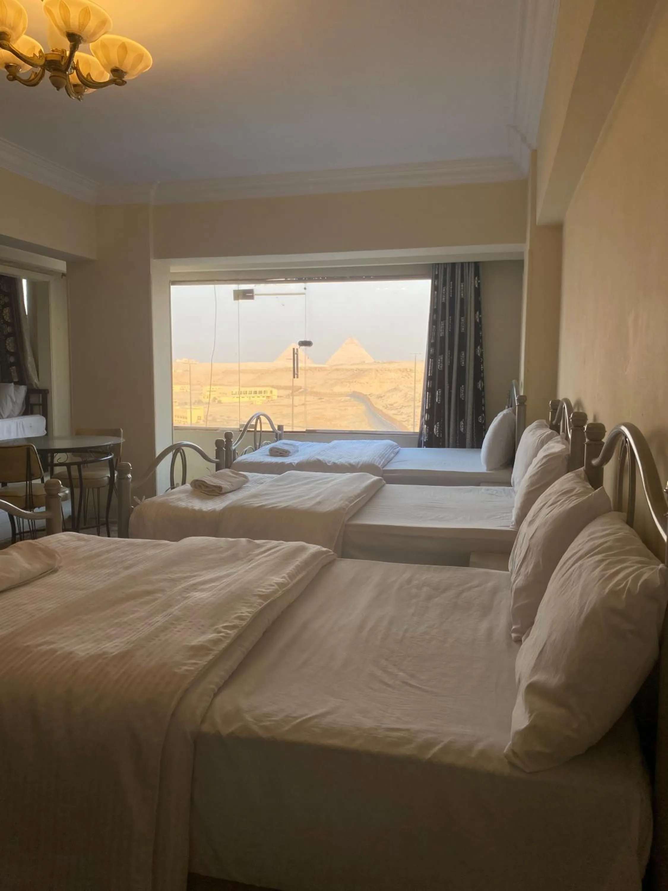 Photo of the whole room, Bed in Pyramita Hotel