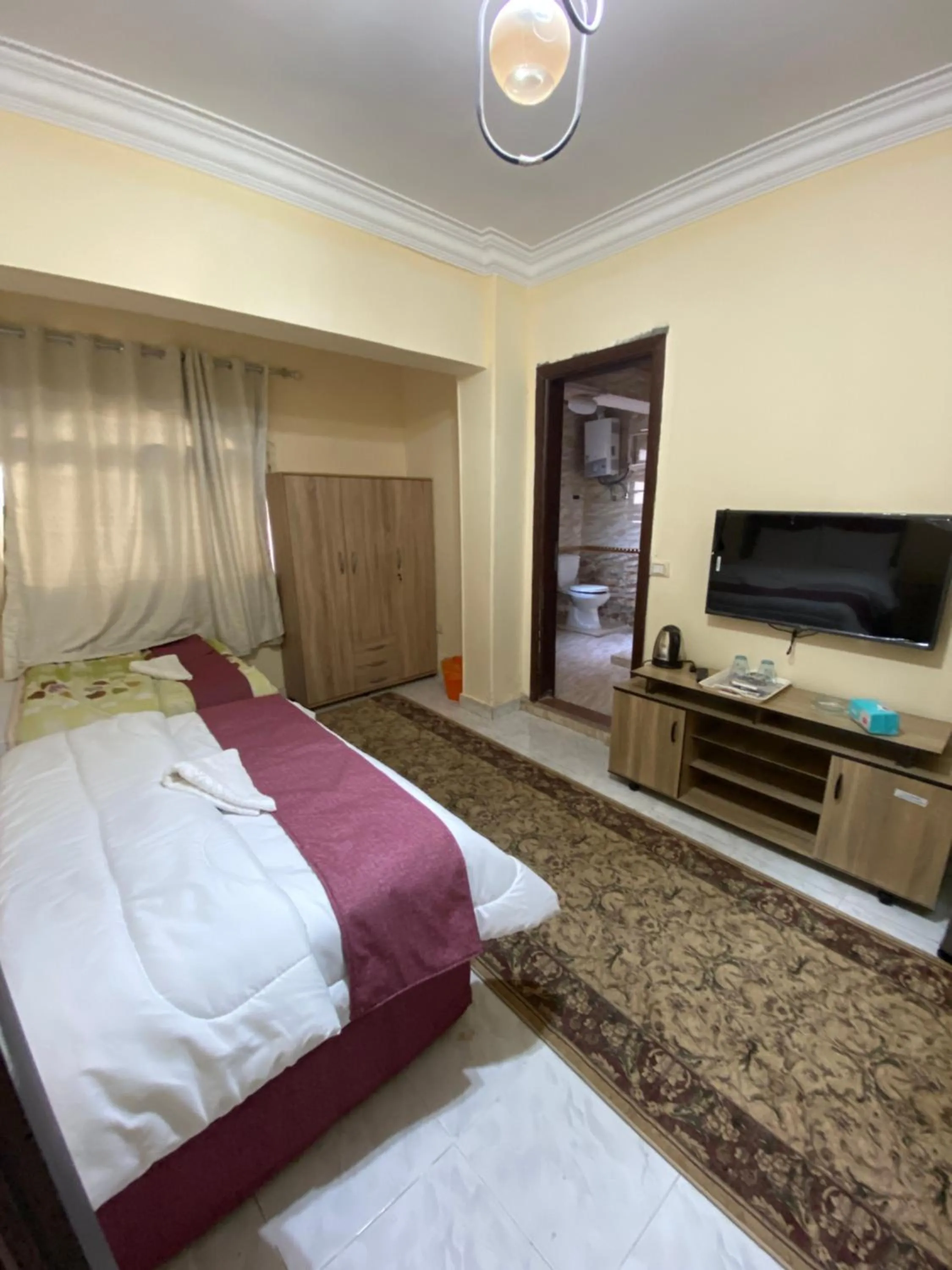 Photo of the whole room, Bed in Pyramita Hotel