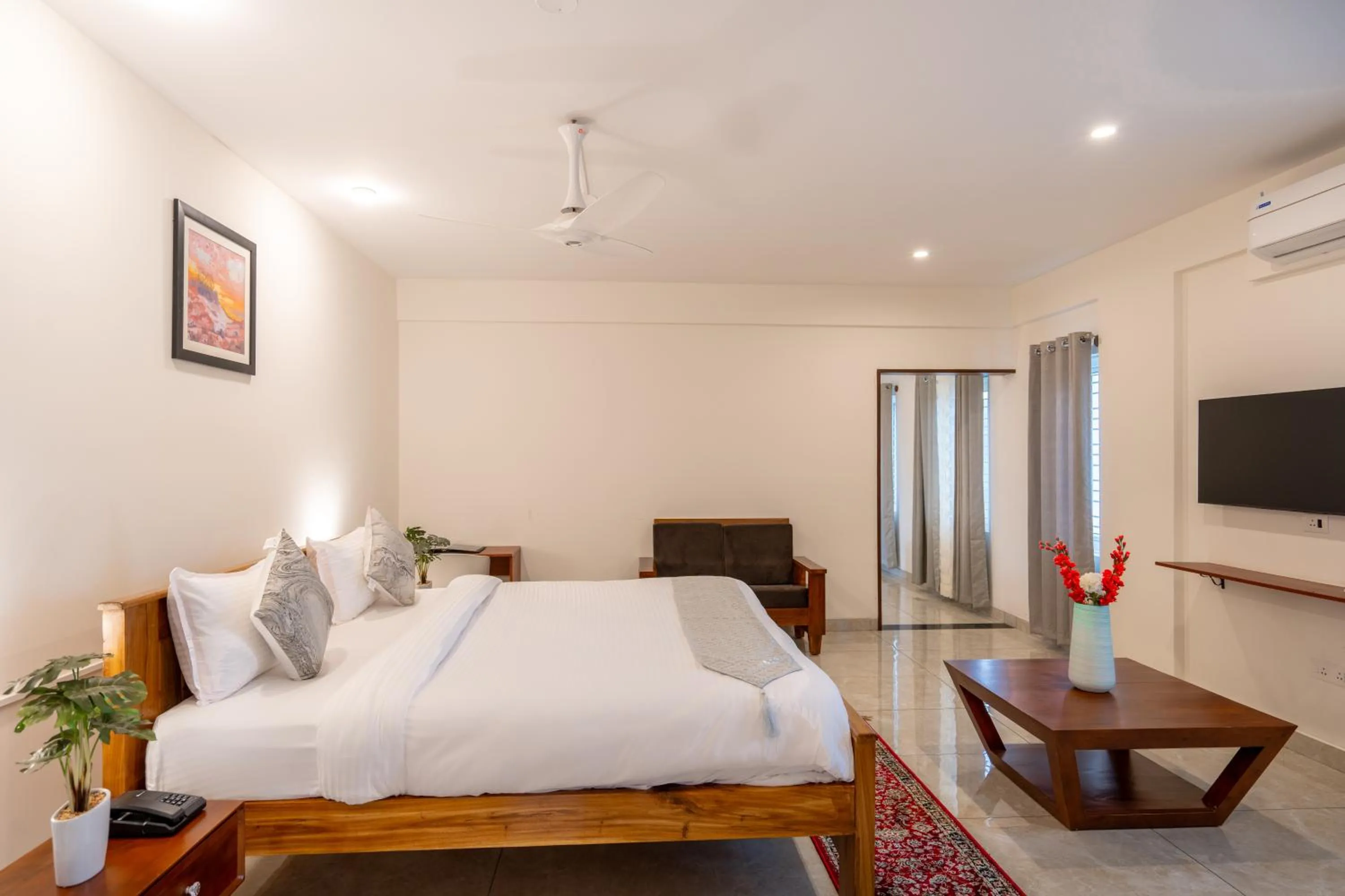 Bed in The Silver Chimes Suites