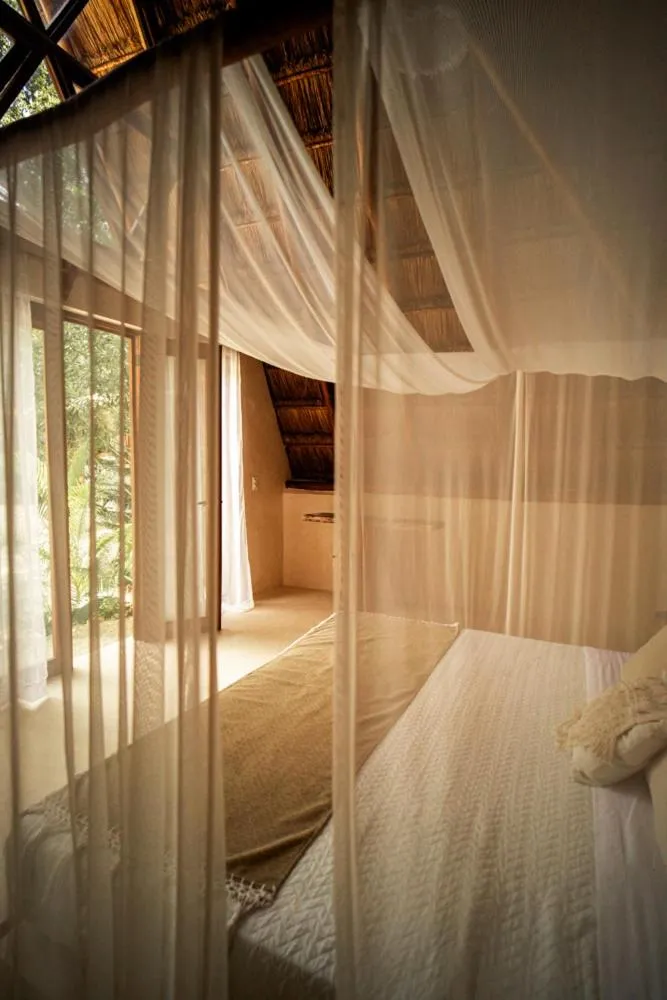 Bed in Lodge Tzunum Jade