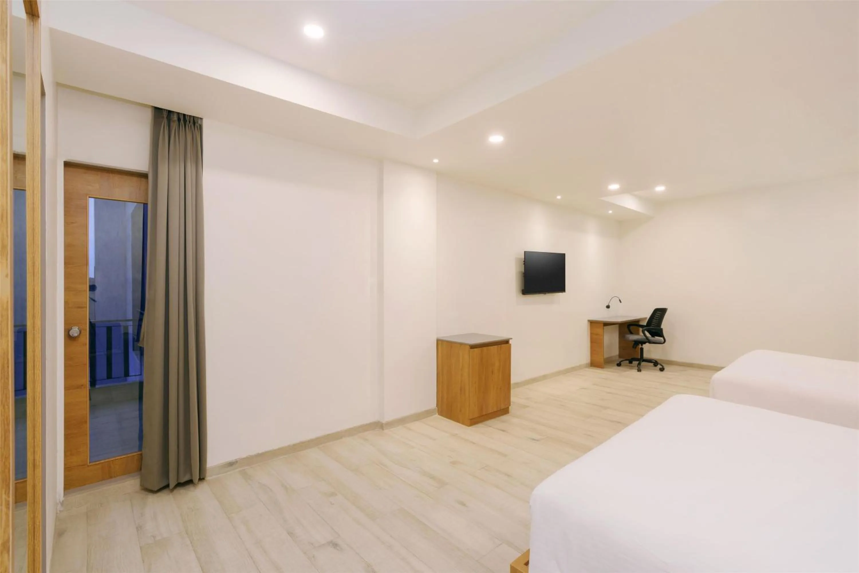 Photo of the whole room, Bed in D Square Statue of Unity Kevadia, a member of Radisson Individuals