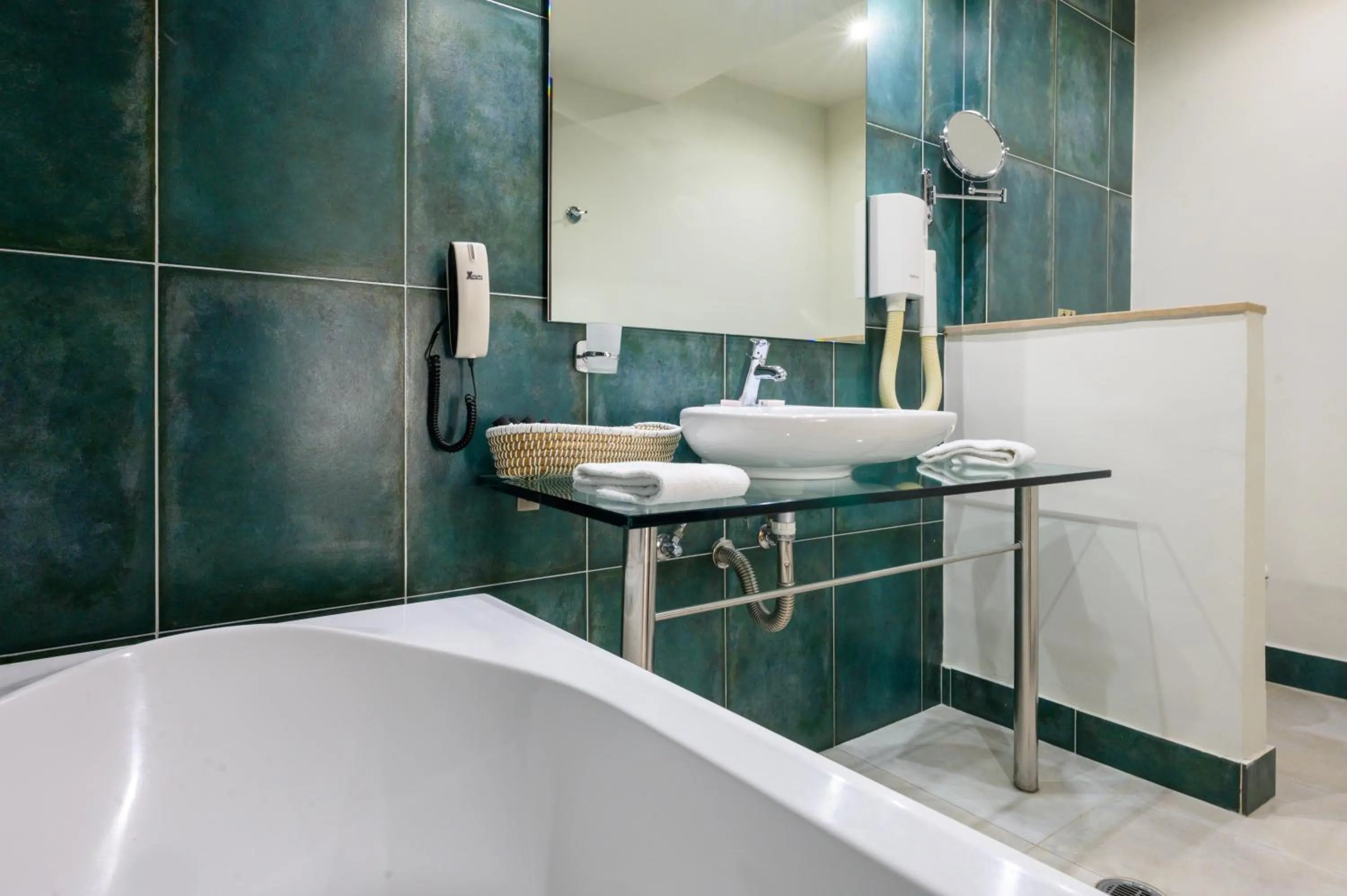 Bathroom in Angela Suites Boutique Hotel