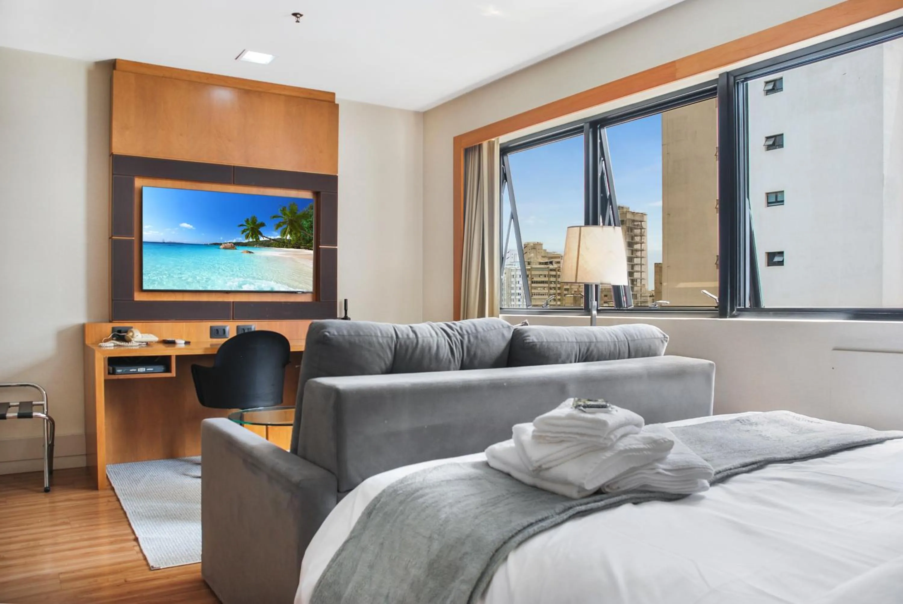 Communal lounge/ TV room, Bed in Hotel Corporativo na Faria Lima