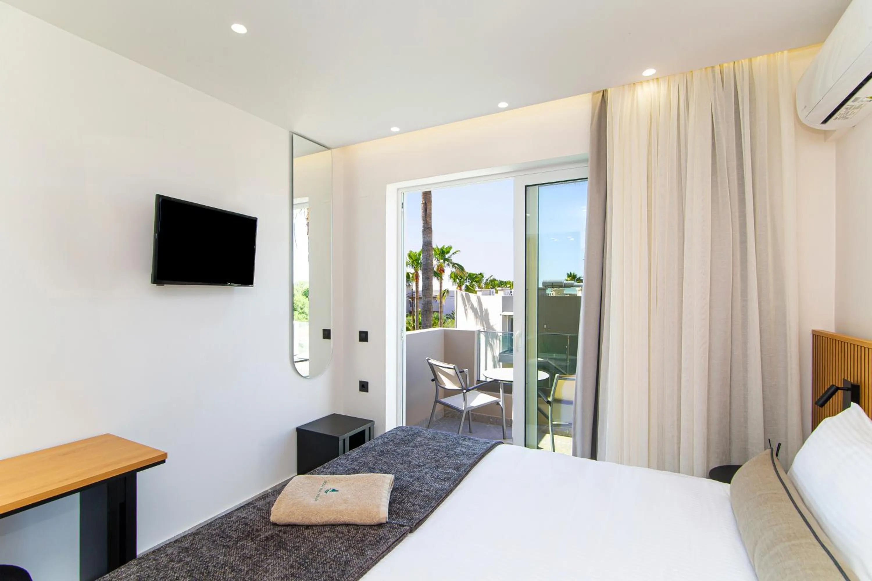 Bed in Aeolos Beach Resort