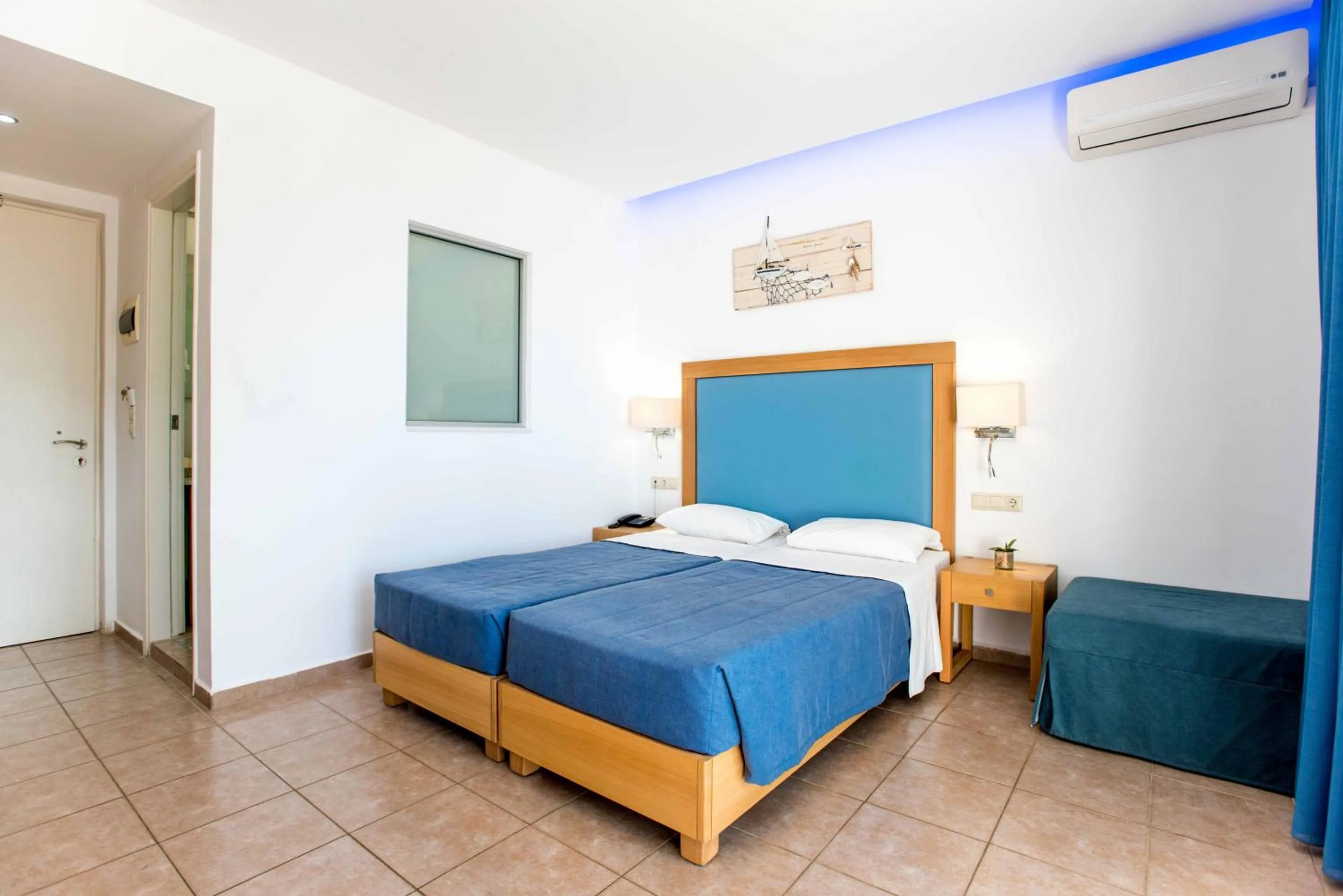 Bed in Aeolos Beach Resort