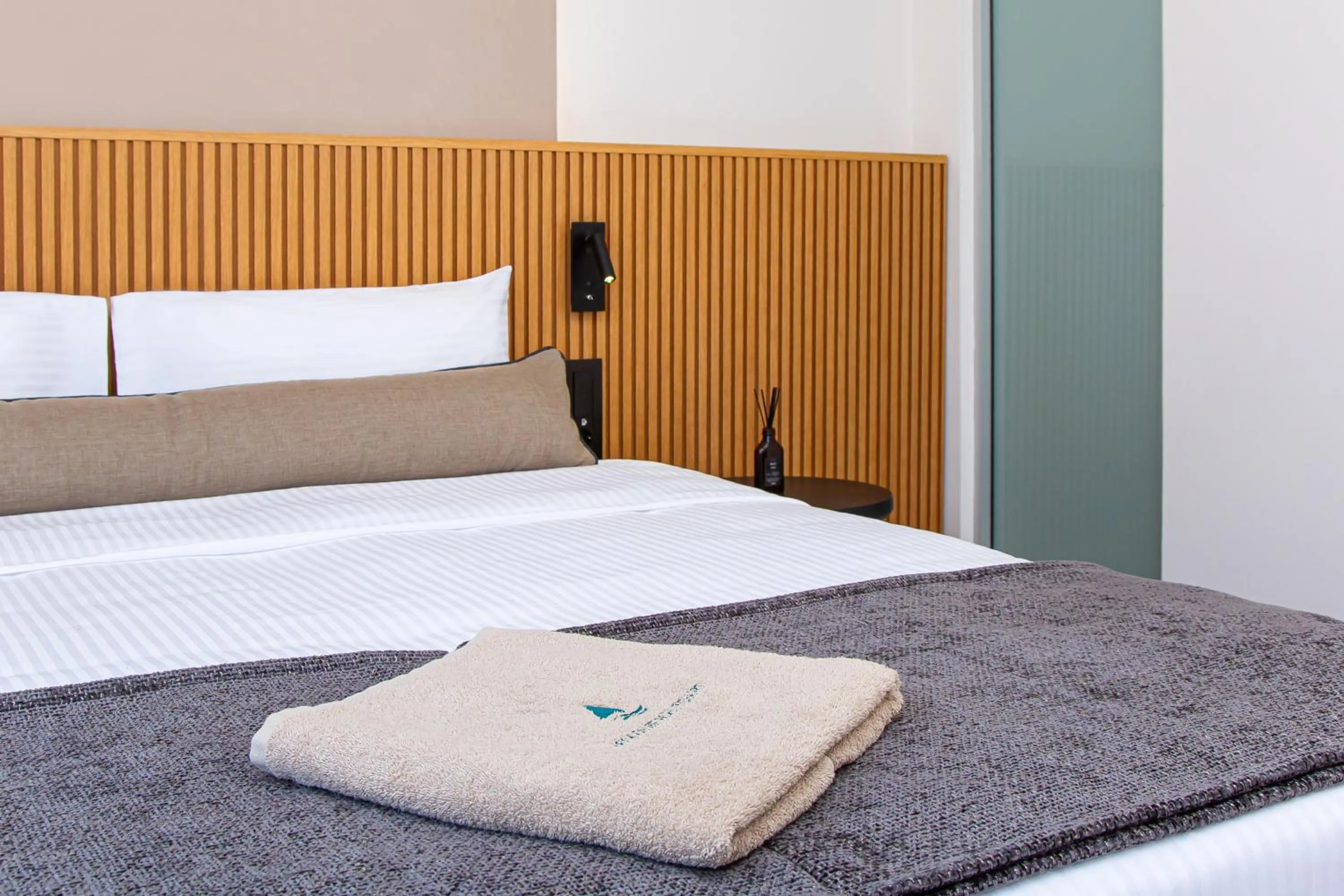 Bed in Aeolos Beach Resort