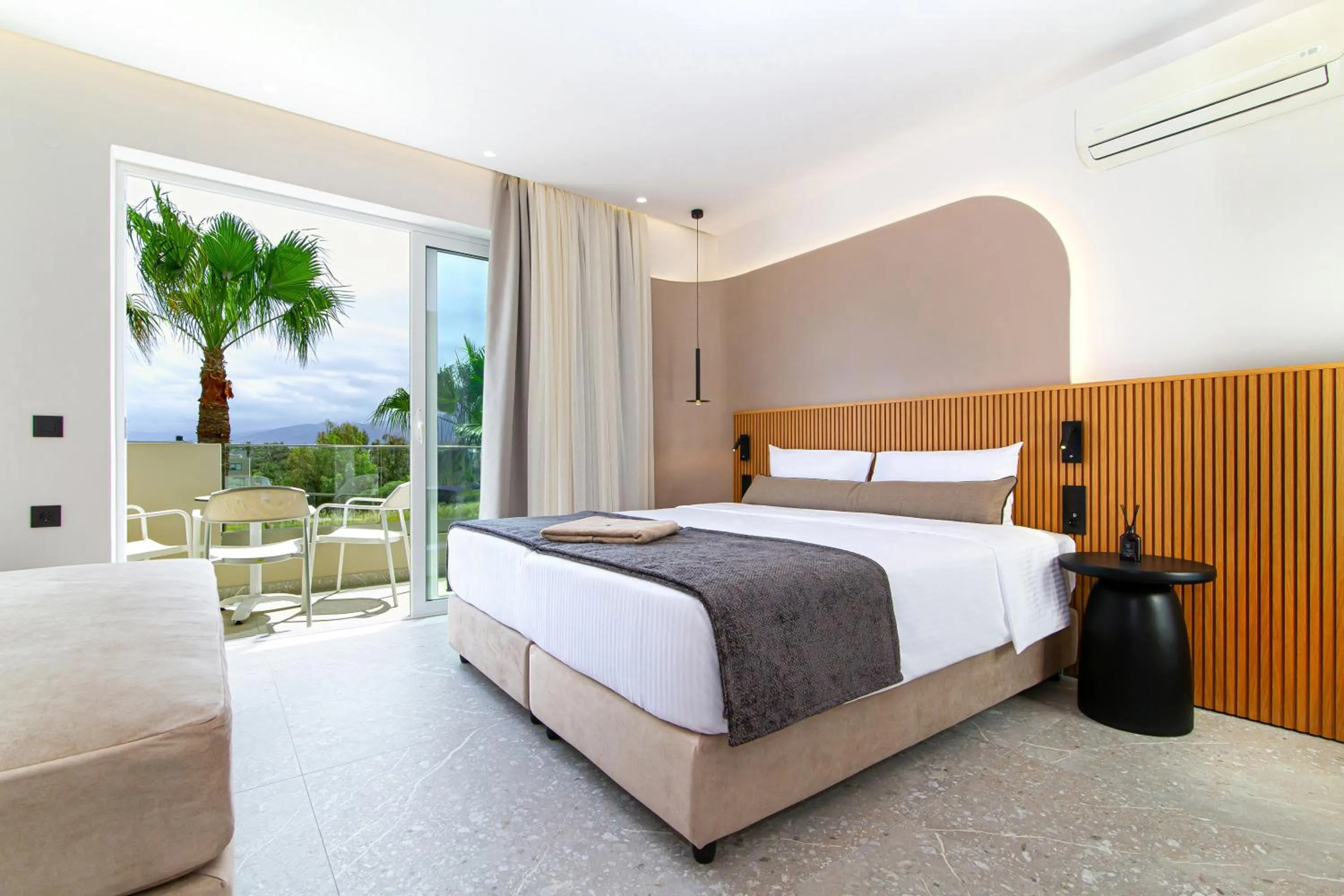 Bed in Aeolos Beach Resort