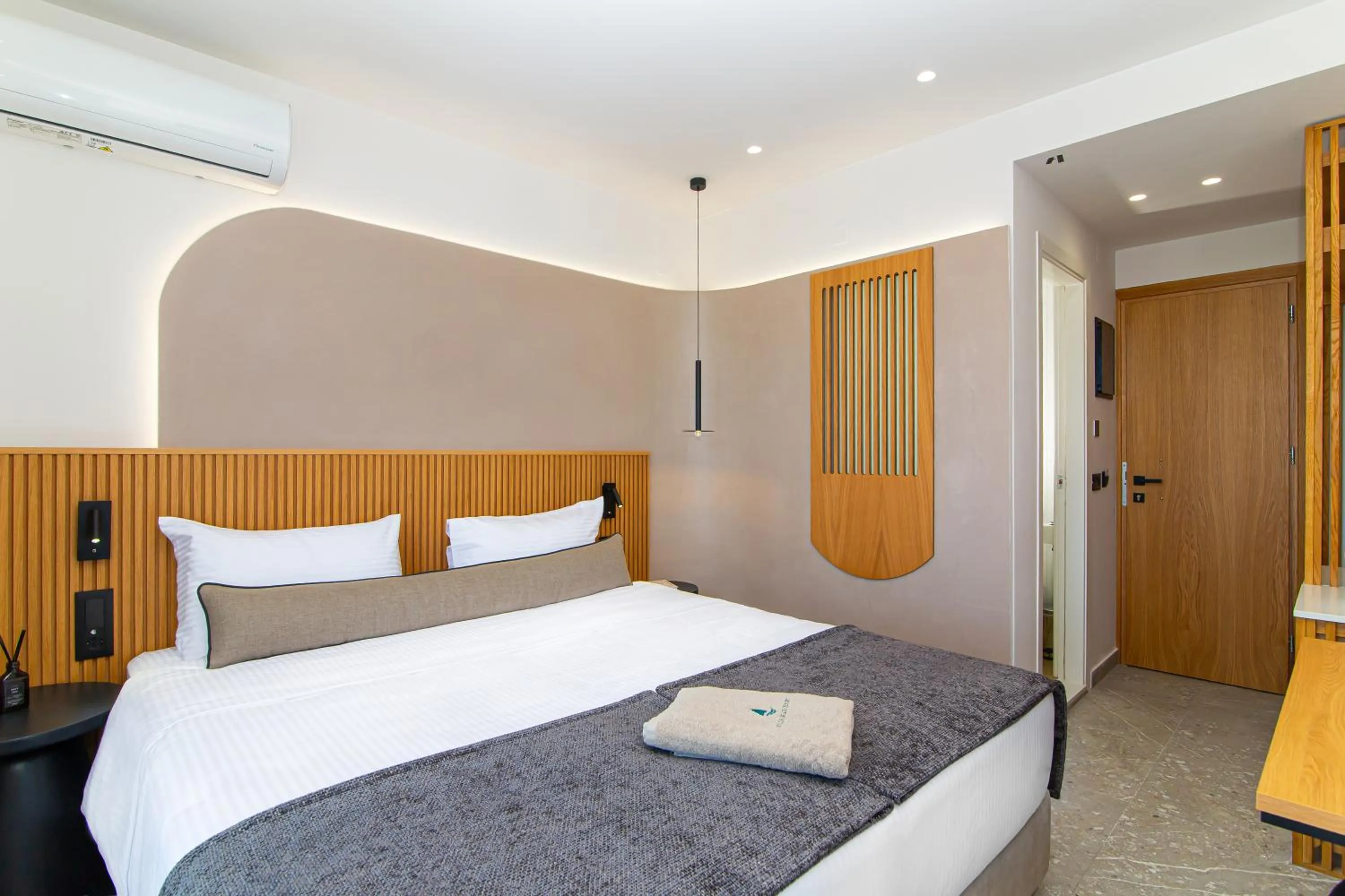 Bed in Aeolos Beach Resort