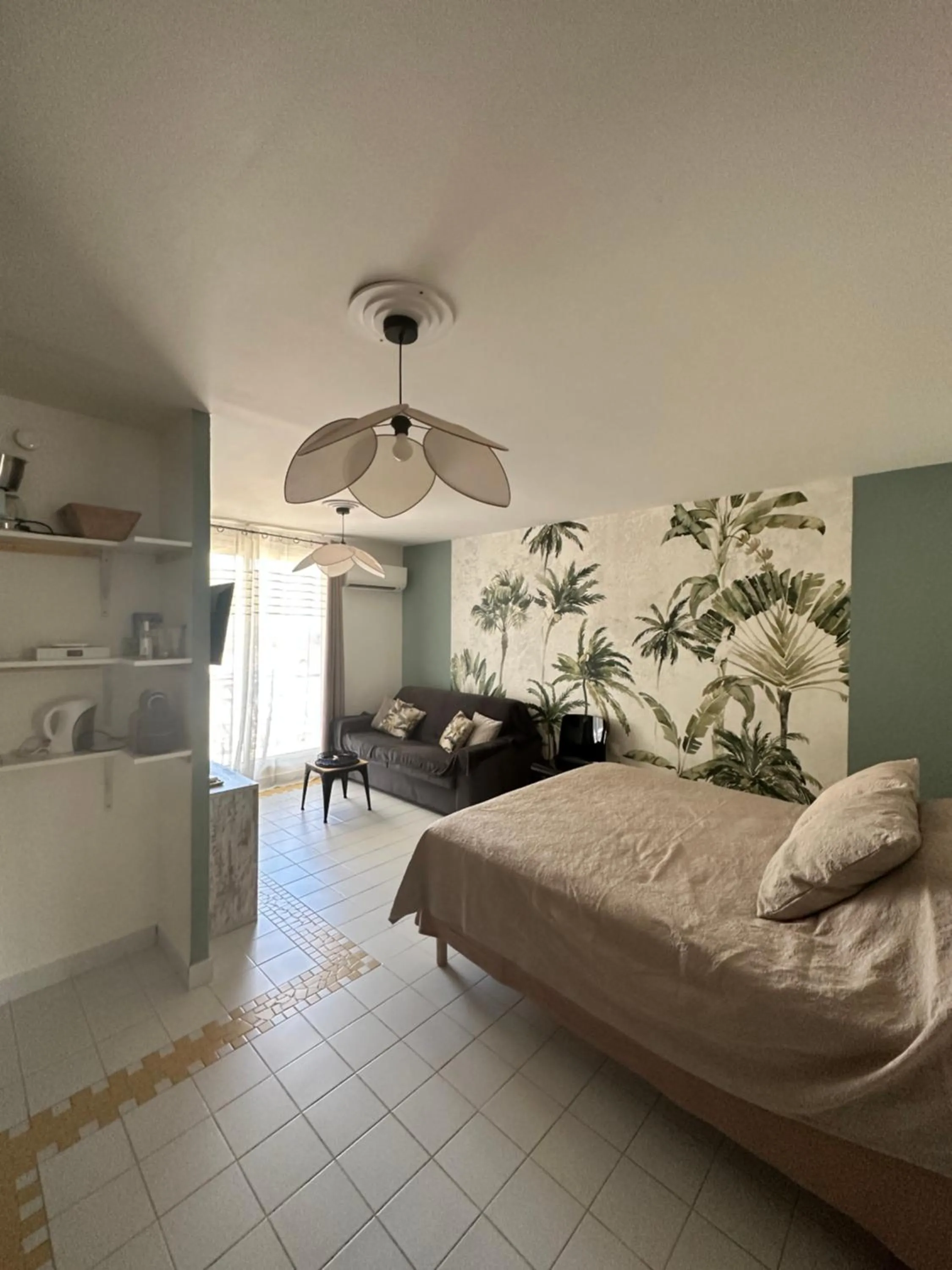Photo of the whole room, Bed in Nouveau le Ti Merveilleux du Manganao, accès plage