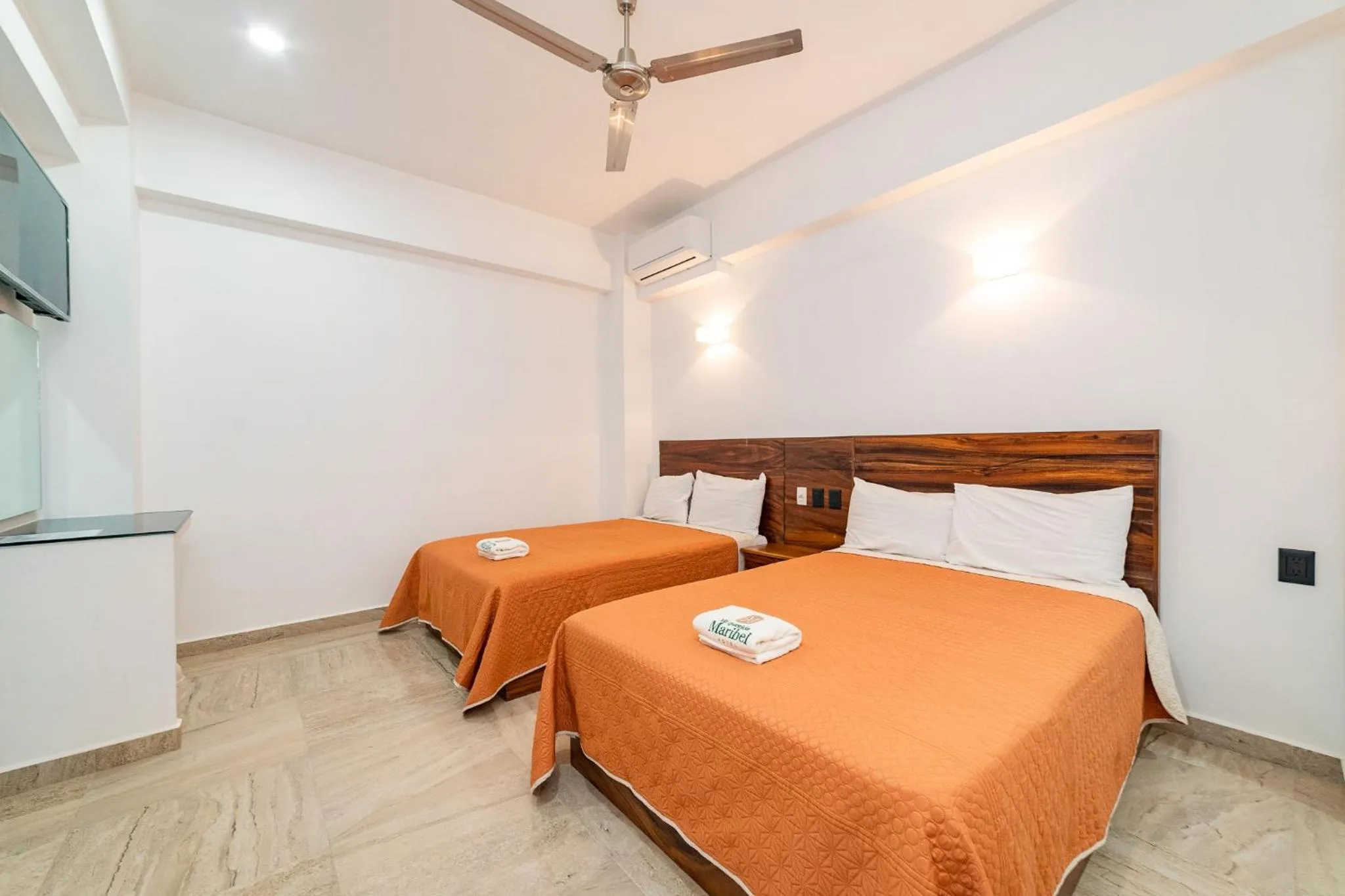 Bed in Mi Querida Maribel Hotel