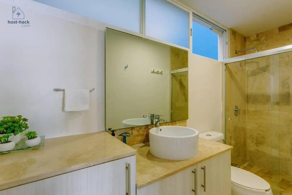 Bathroom in Dpto a 5 min de la Playa con Piscina y Rooftop