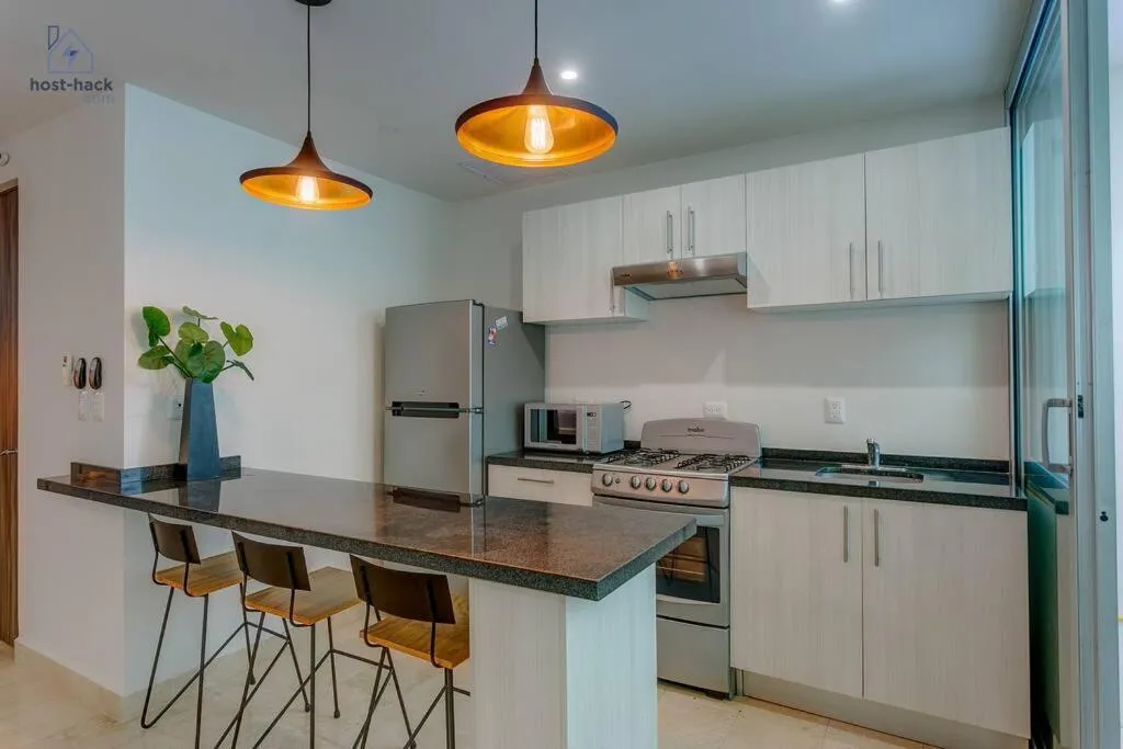 Kitchen or kitchenette in Danzamar 4, 5 blocks away from Playa Pelicanos