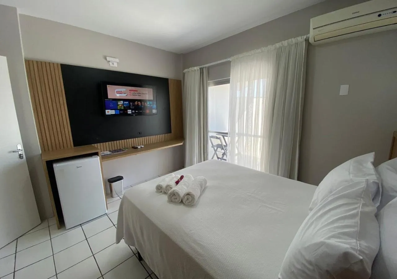 Photo of the whole room, Bed in Ilha Forte Praia Hotel
