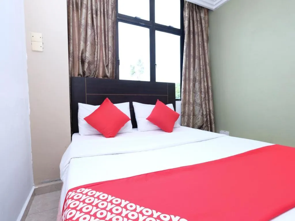 View (from property/room), Bed in MRJ Hotel Wakaf Che Yeh 2