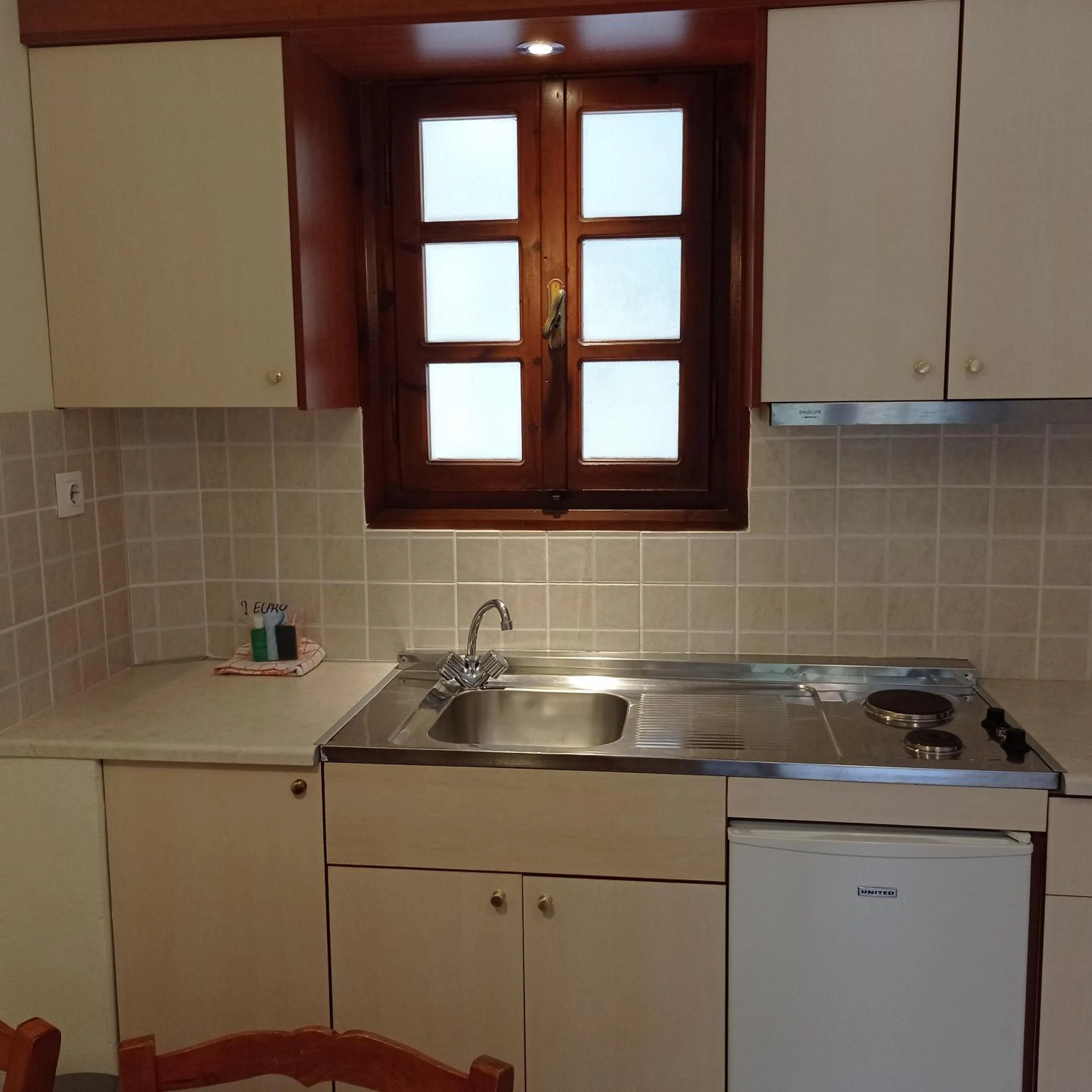 Kitchen or kitchenette in Alexandros Studios