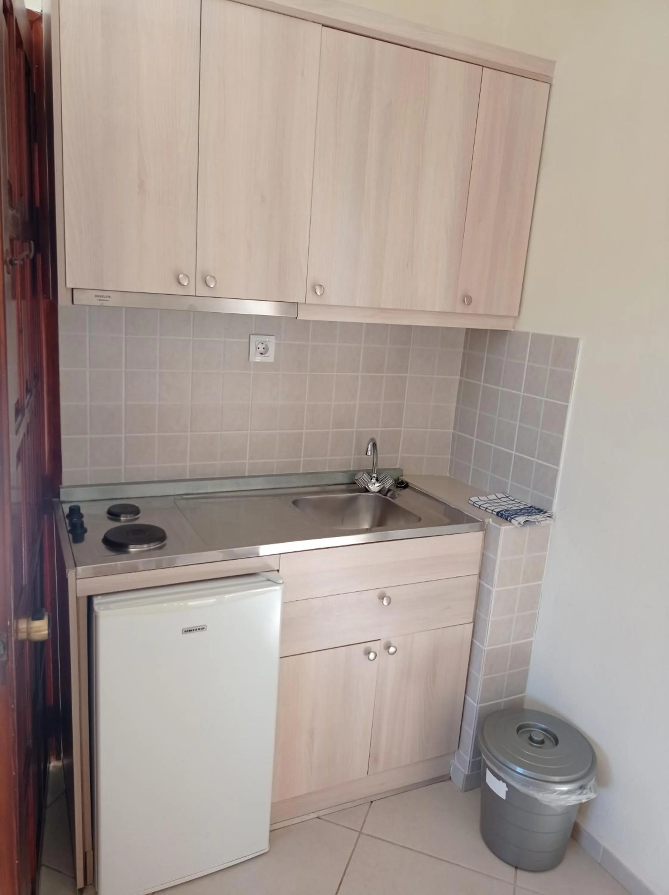 Kitchen or kitchenette in Alexandros Studios