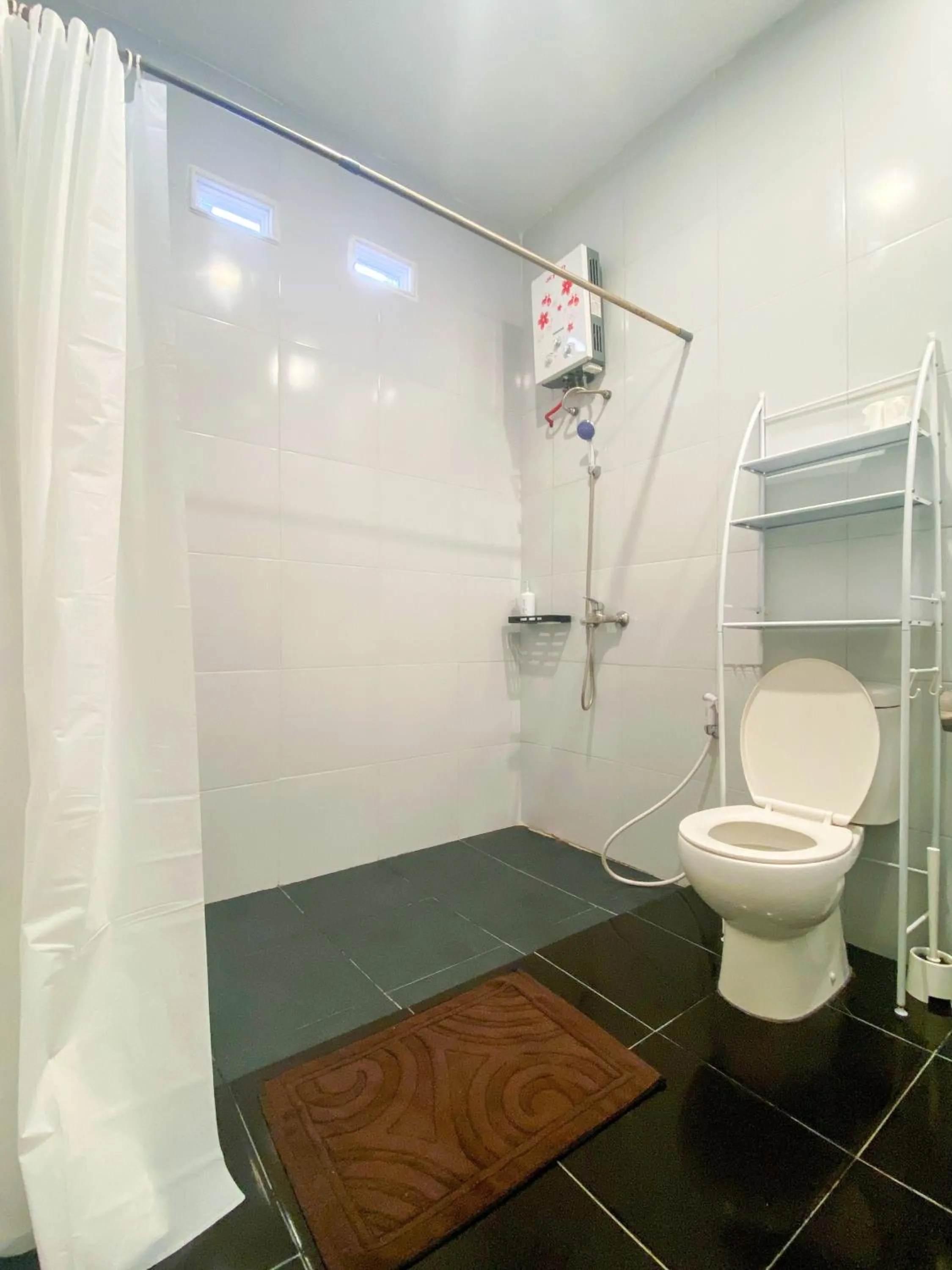 Shower in Snooze Malang