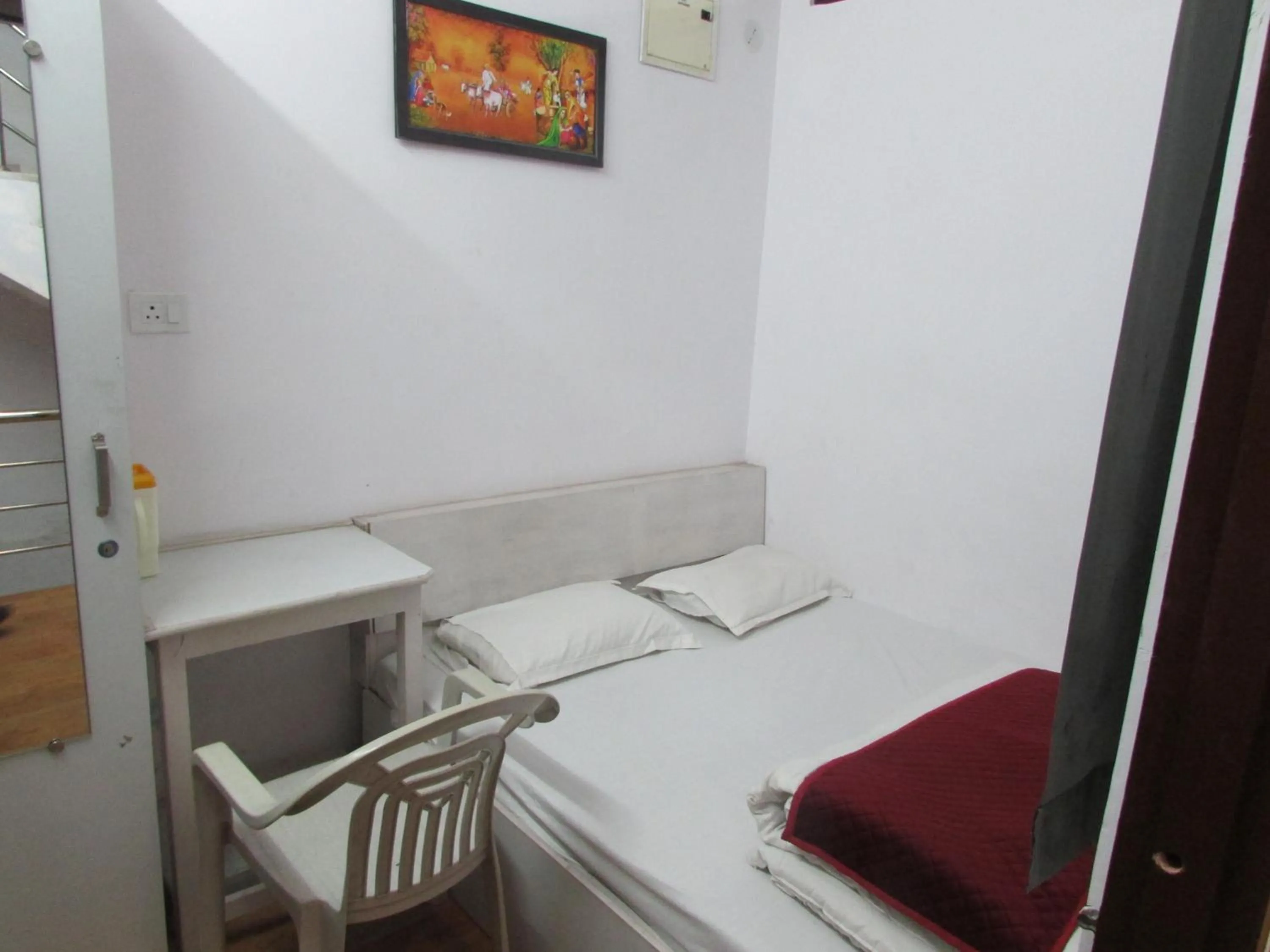 Bed in Ashish Guest House, Udaipole