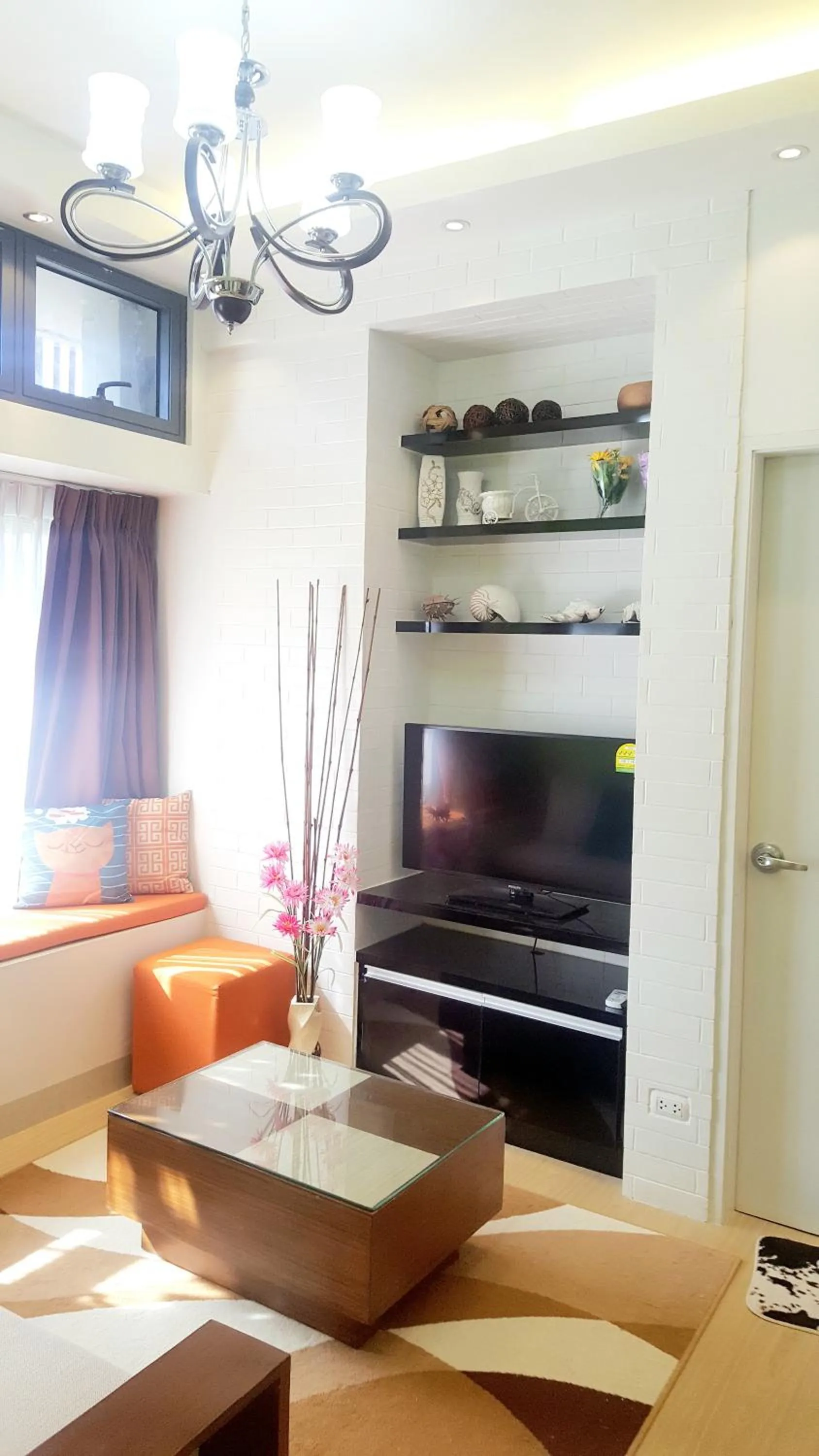 TV and multimedia in The Levels 2BR Condo Fully Interior Cosmo Living