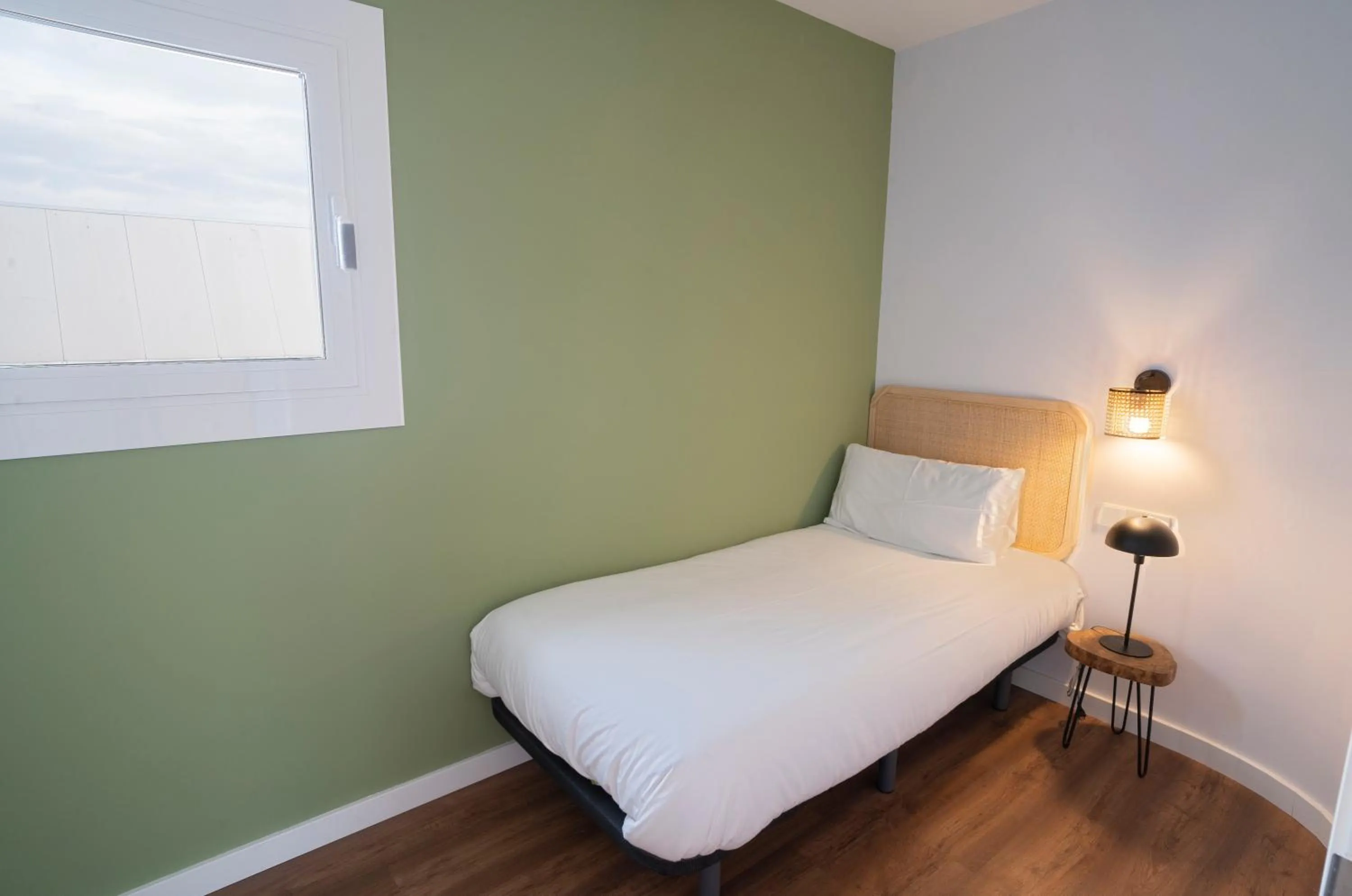 Bed in Caliu Apartments Barcelona - Camp Nou